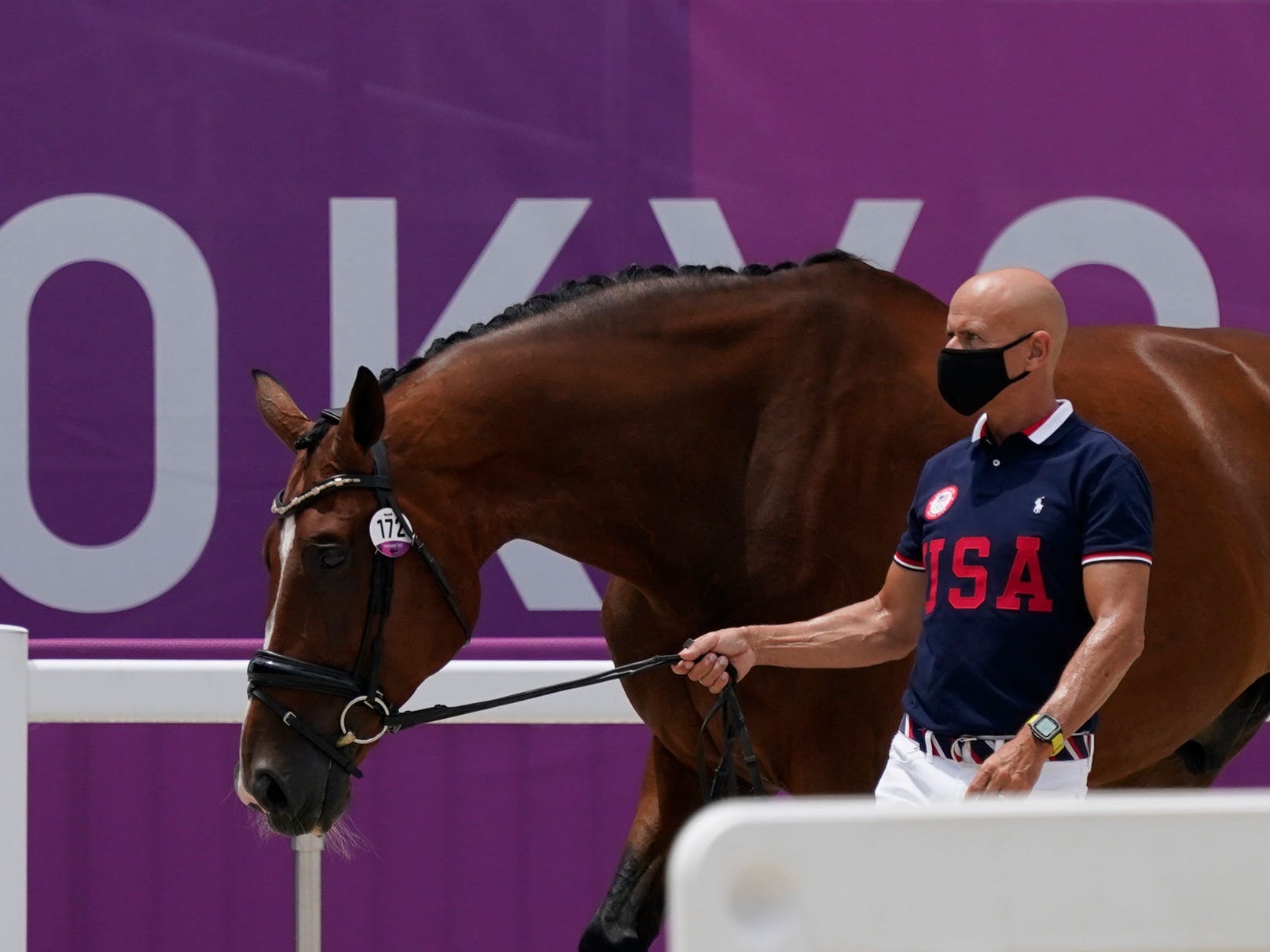 United States' Steffen Peters, walks with Suppenkasper, nicknamed Mopsi.