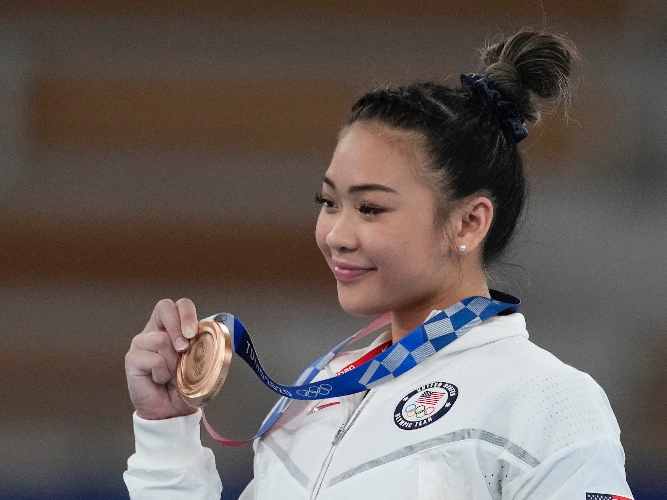 Suni Lee failed to win gold on the uneven bars and blamed the 'mess up