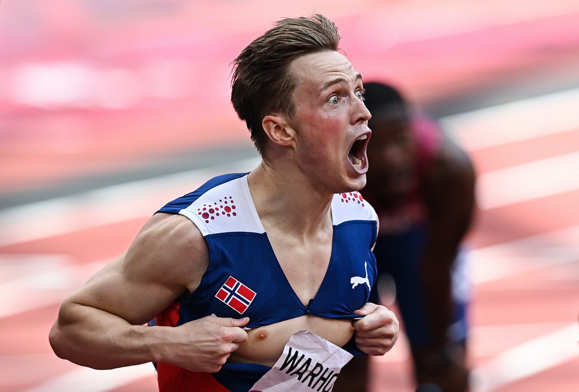 Karsten Warholm of Norway reacts after setting a new world record, of 45.94 in the 400 meter hurdles.