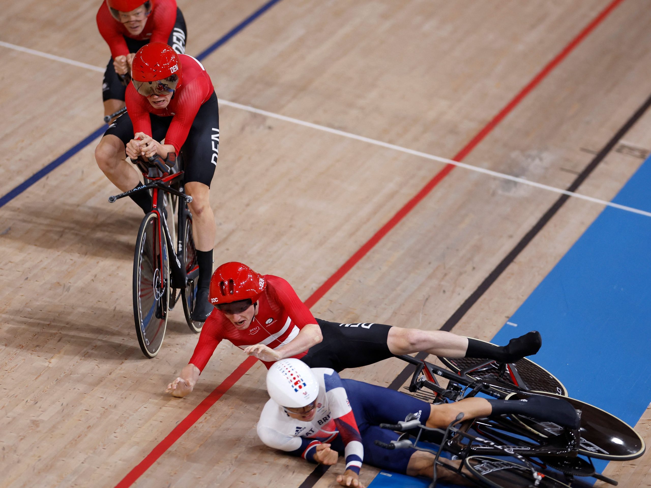 Danish rider Frederik Madsen crashes into the back of Team GB’s Harry Tanfield