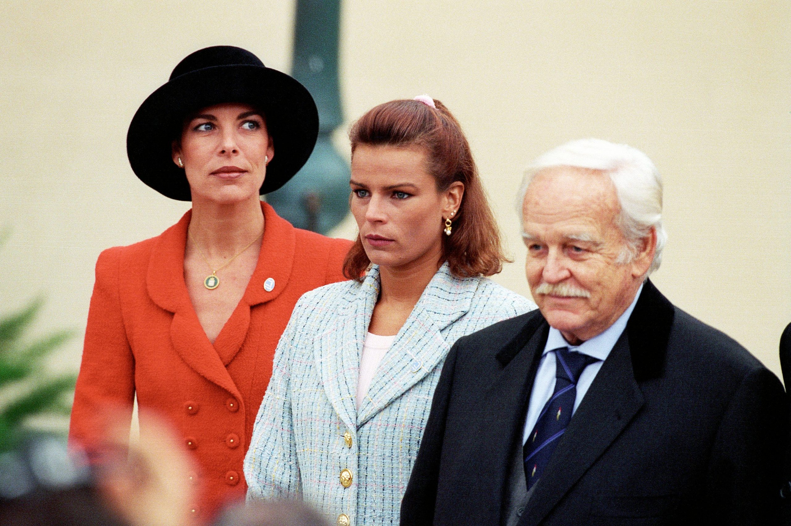Princess Caroline (left) pictured next to her sister Princess Stéphanie (center) and their father Prince Rainier of Monaco.