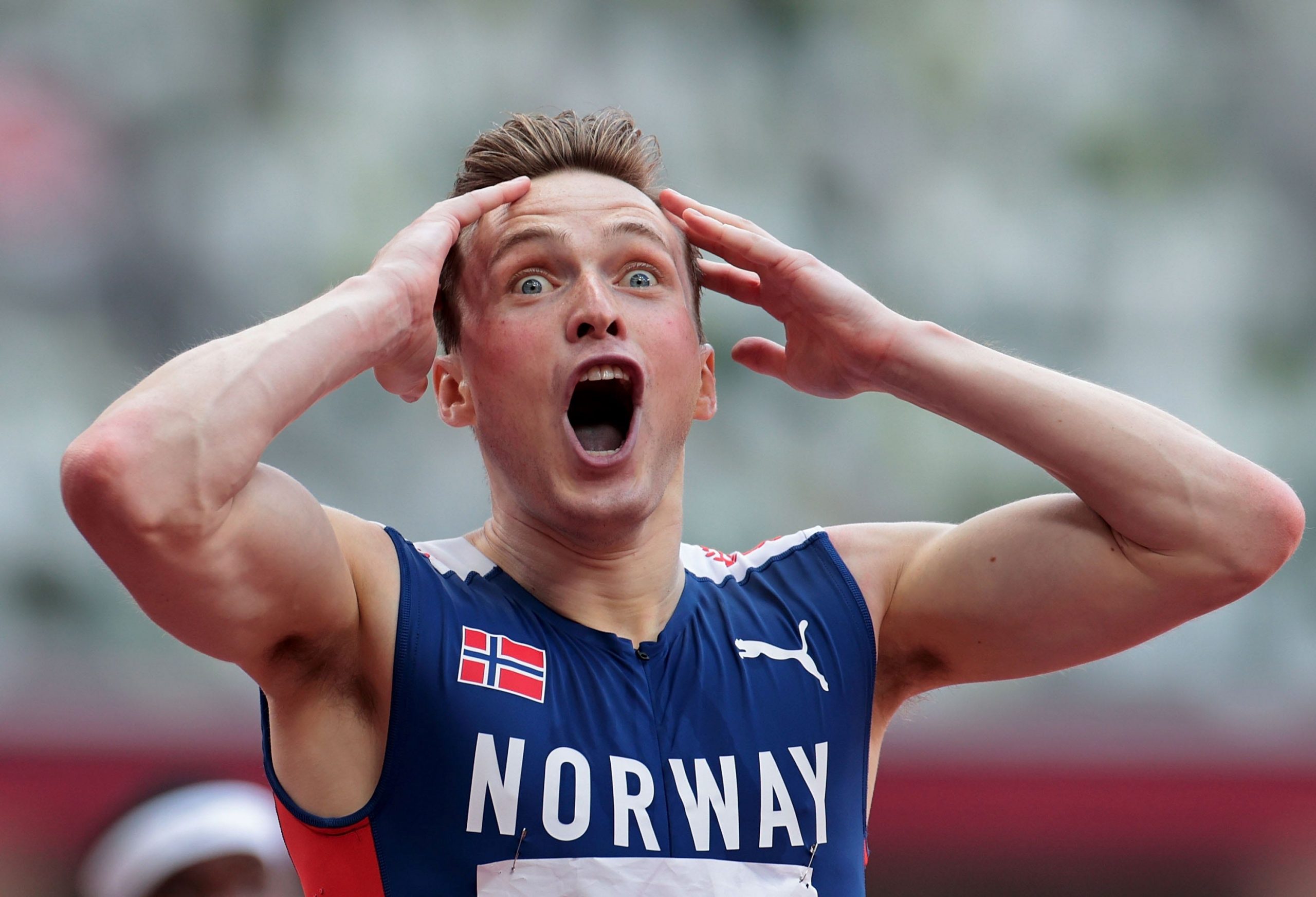 Karsten Warholm of Norway celebrates after the Men's 400m Hurdles Final at the Tokyo 2020 Olympic Games.