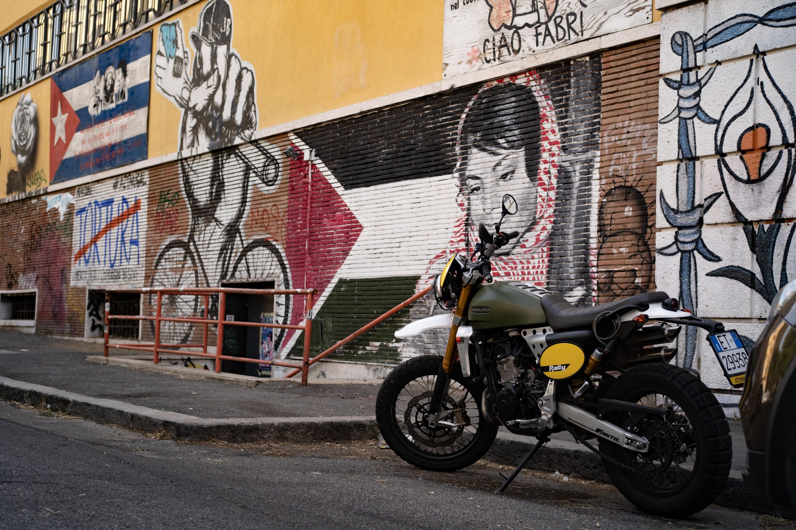 Murals along a roadside.