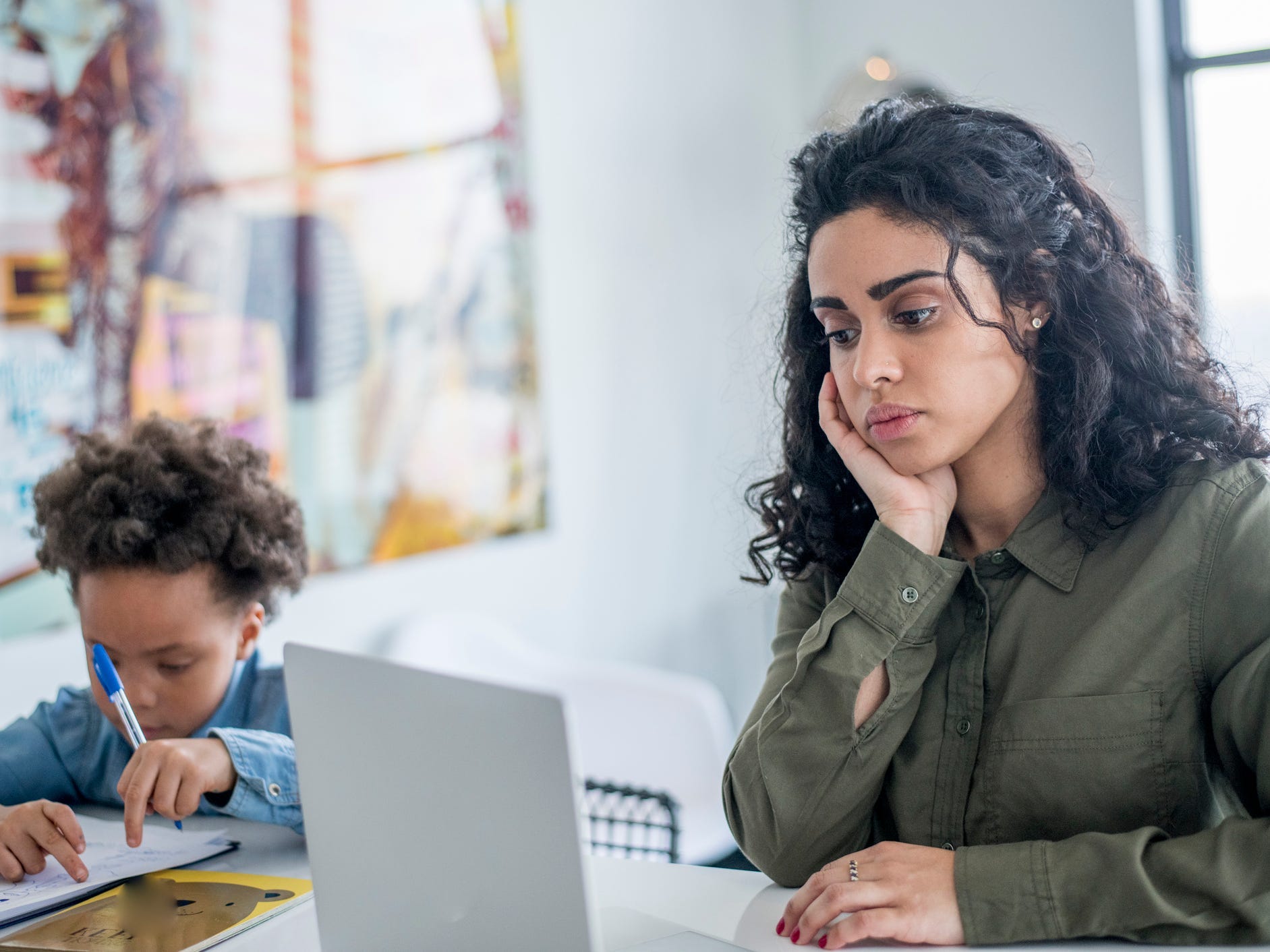 A mom working from home with children