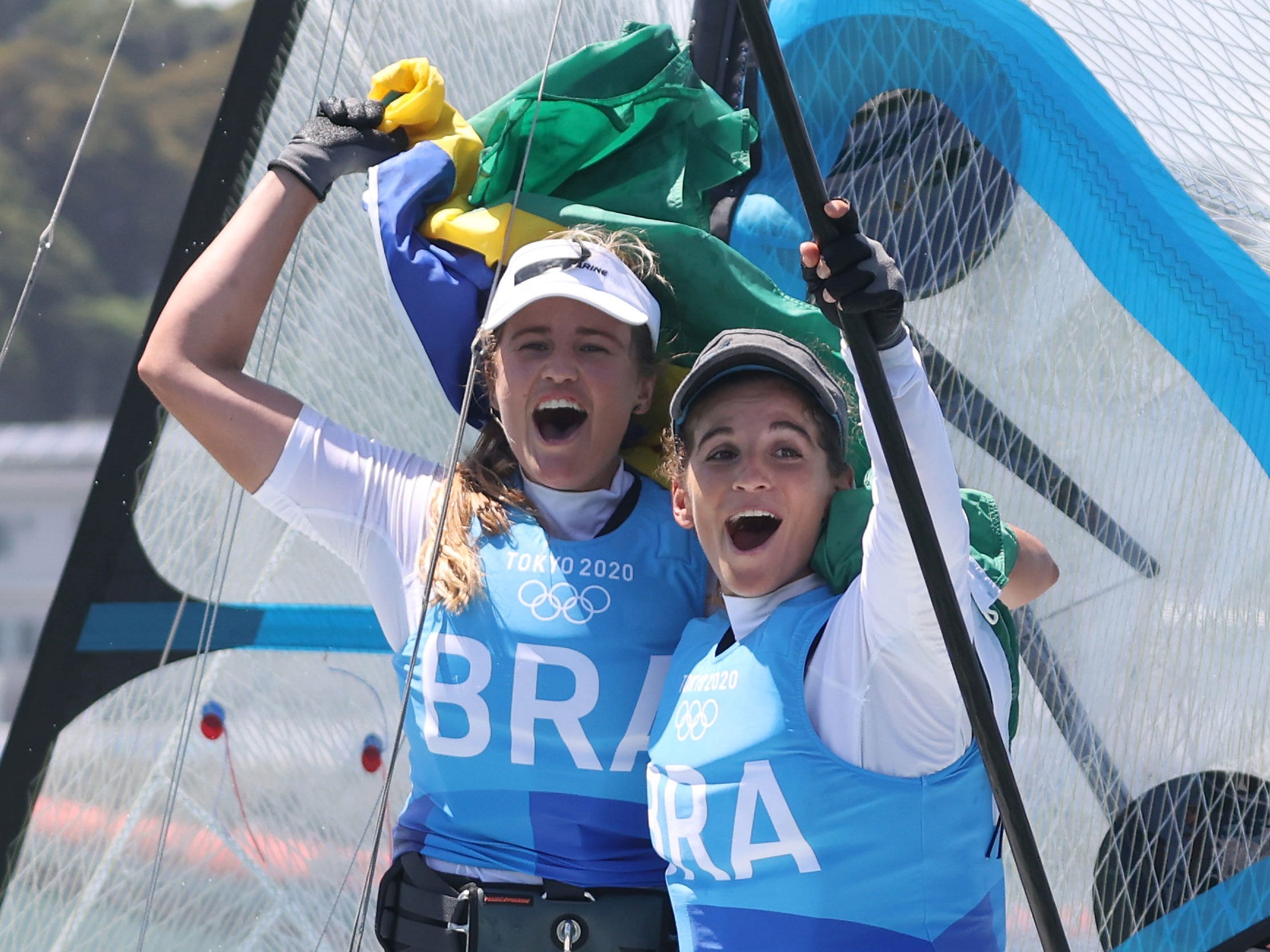 Martine Grael and Kahena Kunze of Team Brazil celebrate winning gold at Tokyo 2020.
