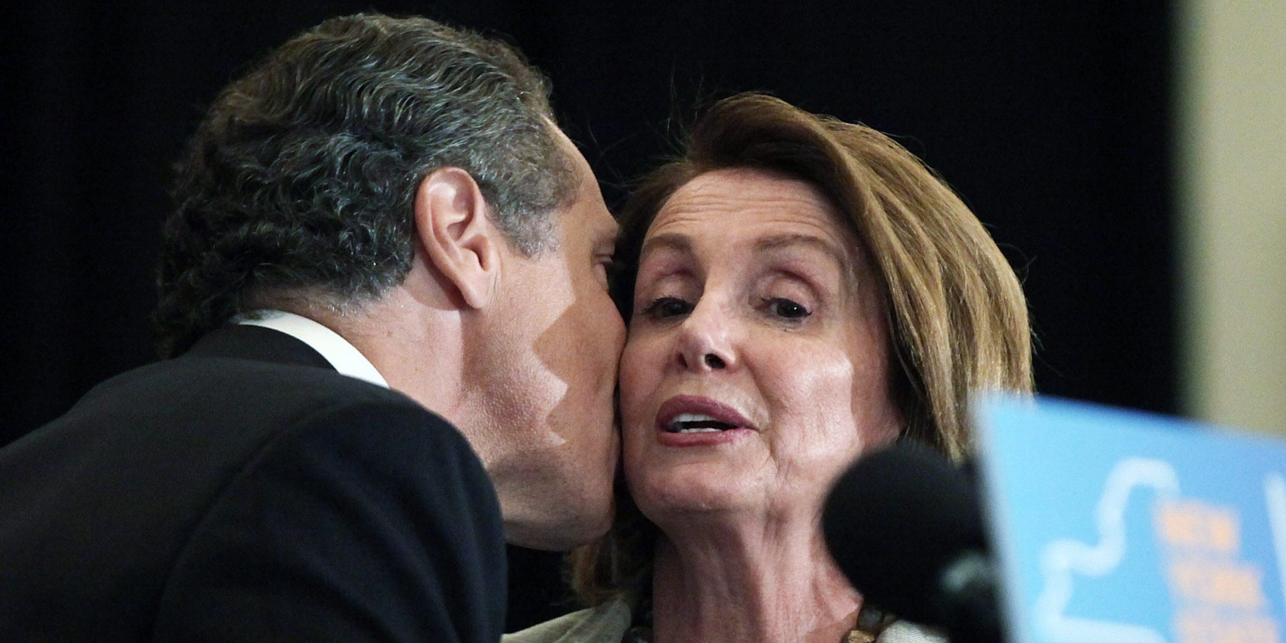 Andrew Cuomo greets Nancy Pelosi at an event at New York University where Cuomo signed into law a new affirmative sexual consent policy to combat campus sexual violence on July 7, 2015 in New York City.
