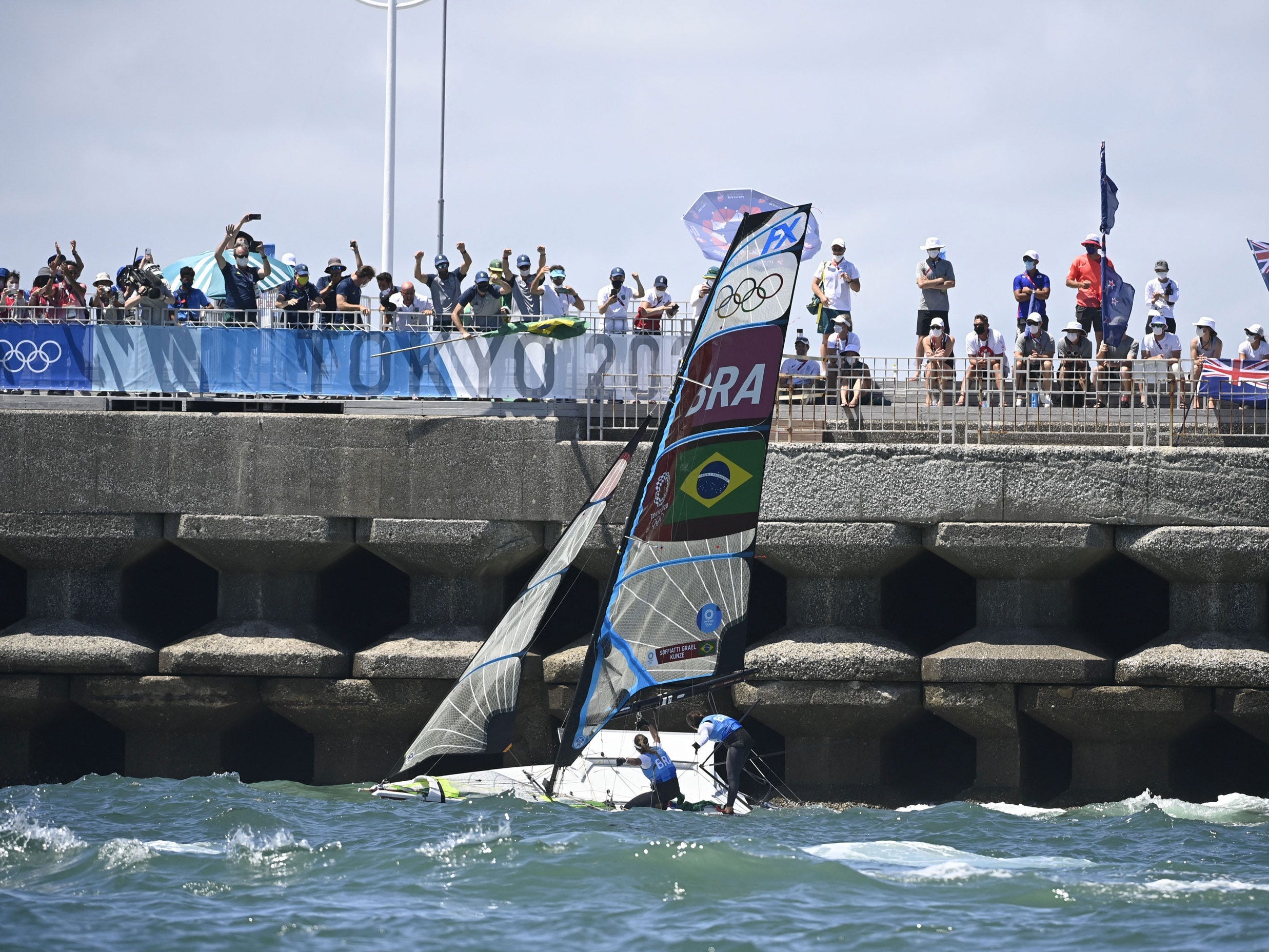 Brazil's Martine Grael and Kahena Kunze celebrate after the women's skiff 49er race.