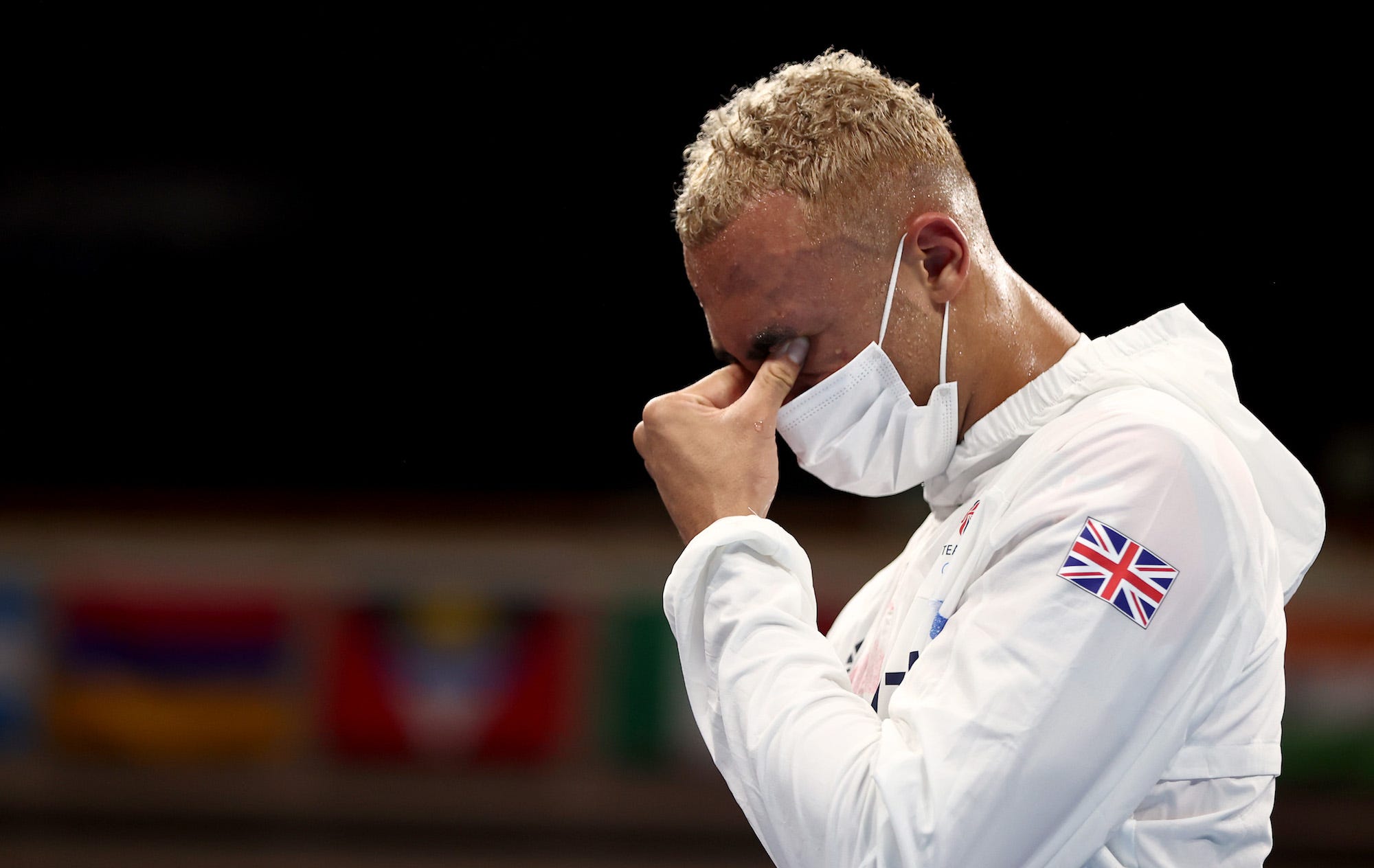 Benjamin Whittaker of Team Great Britain looks dejected during the Victory Ceremony on day twelve of the Tokyo 2020 Olympic Games at Kokugikan Arena