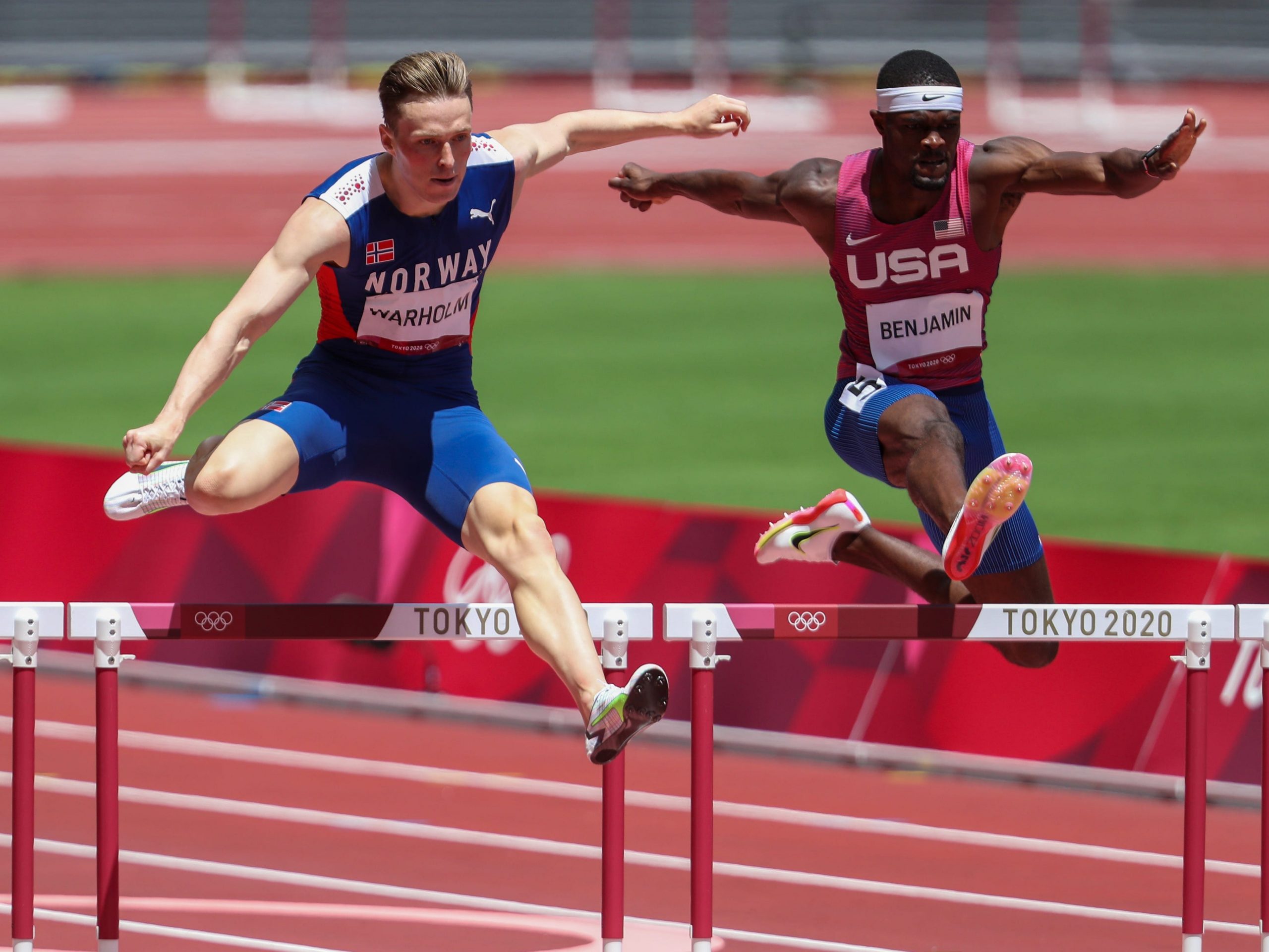 Karsten Warholm of Team Norway leaping over a hurdle