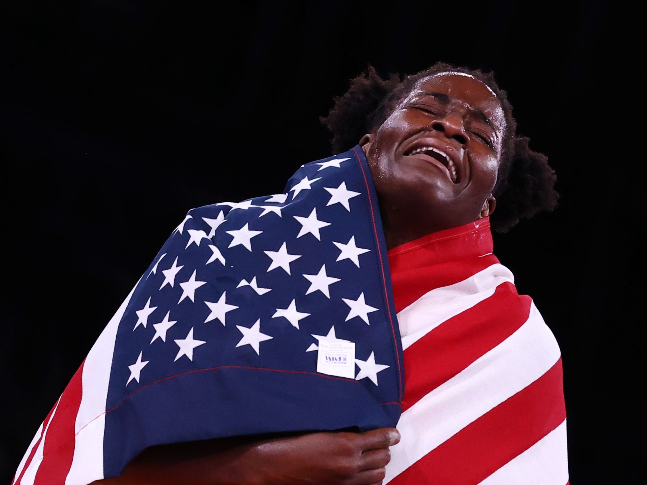 Tamyra Mensah-Stock of Team USA celebrates after winning gold.