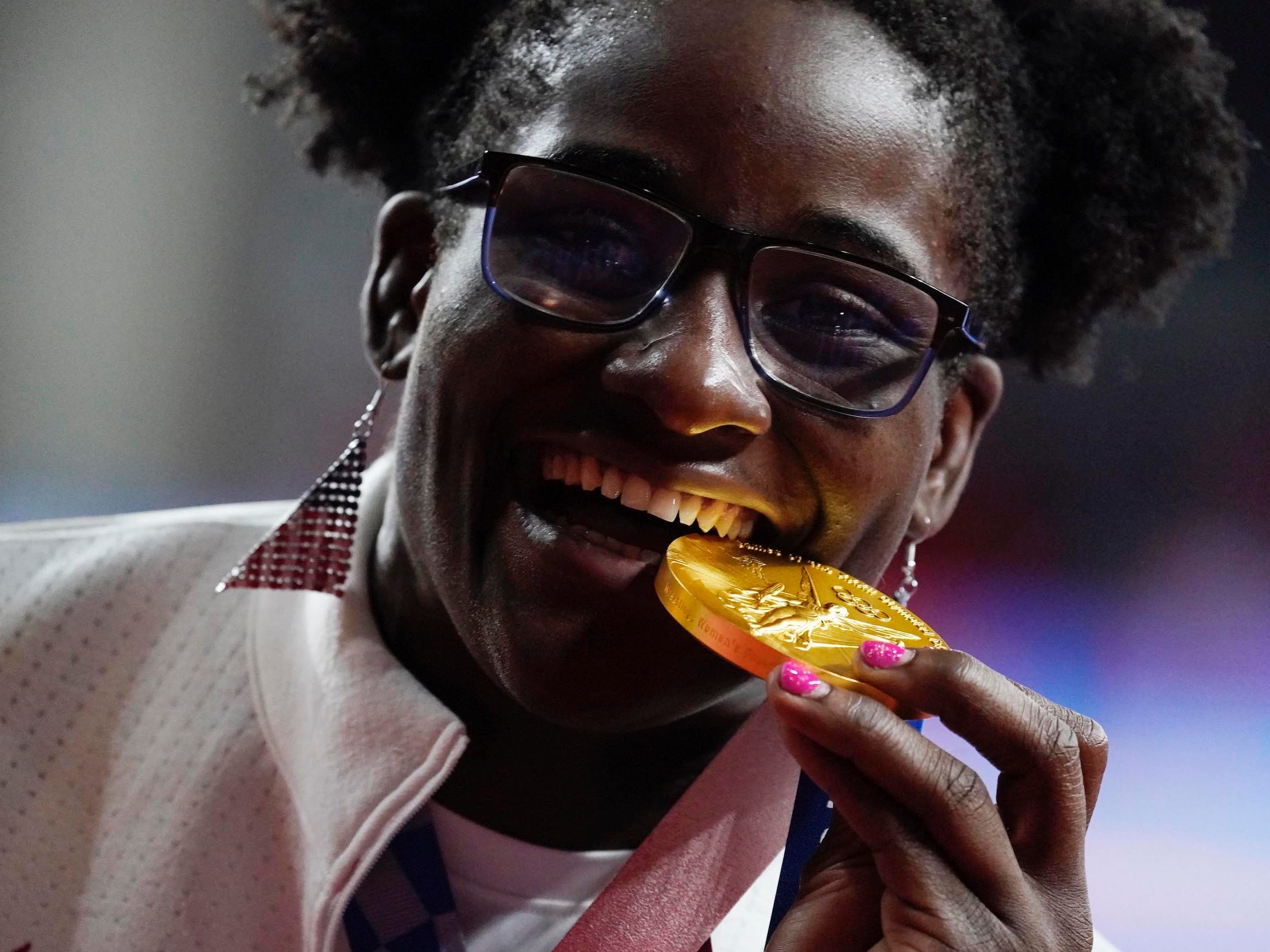 Tamyra Mensah-Stock celebrates her gold medal in the women's freestyle 68kg competition during the Tokyo Olympics.