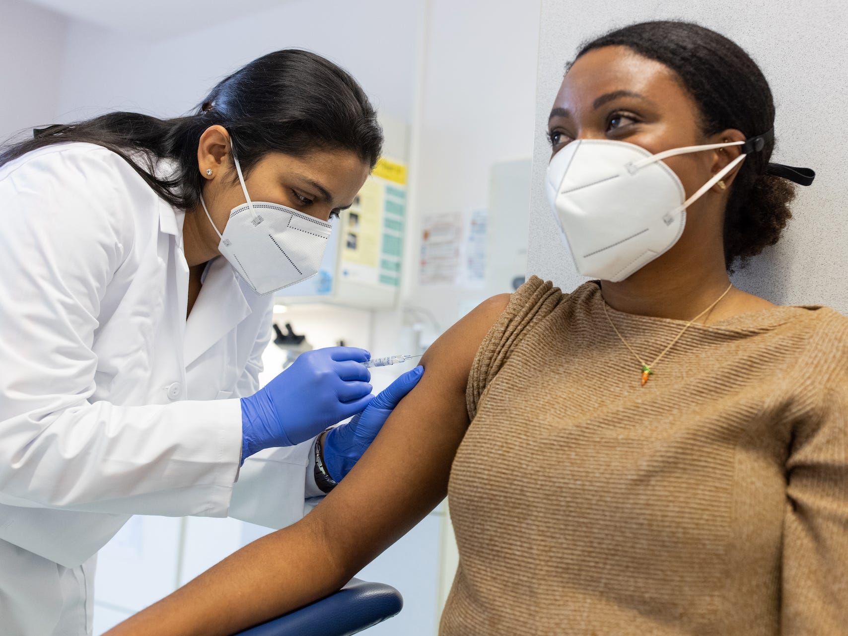 Patient receiving a vaccine shot