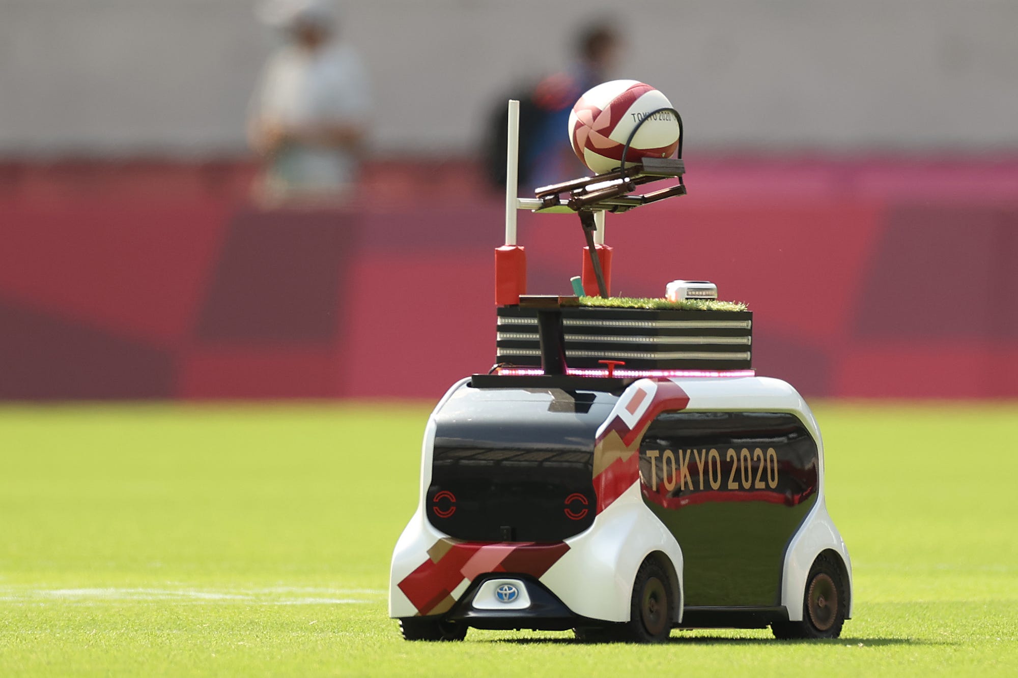 A robot delivers match balls on day three of the Tokyo 2020 Olympic Games at Tokyo Stadium
