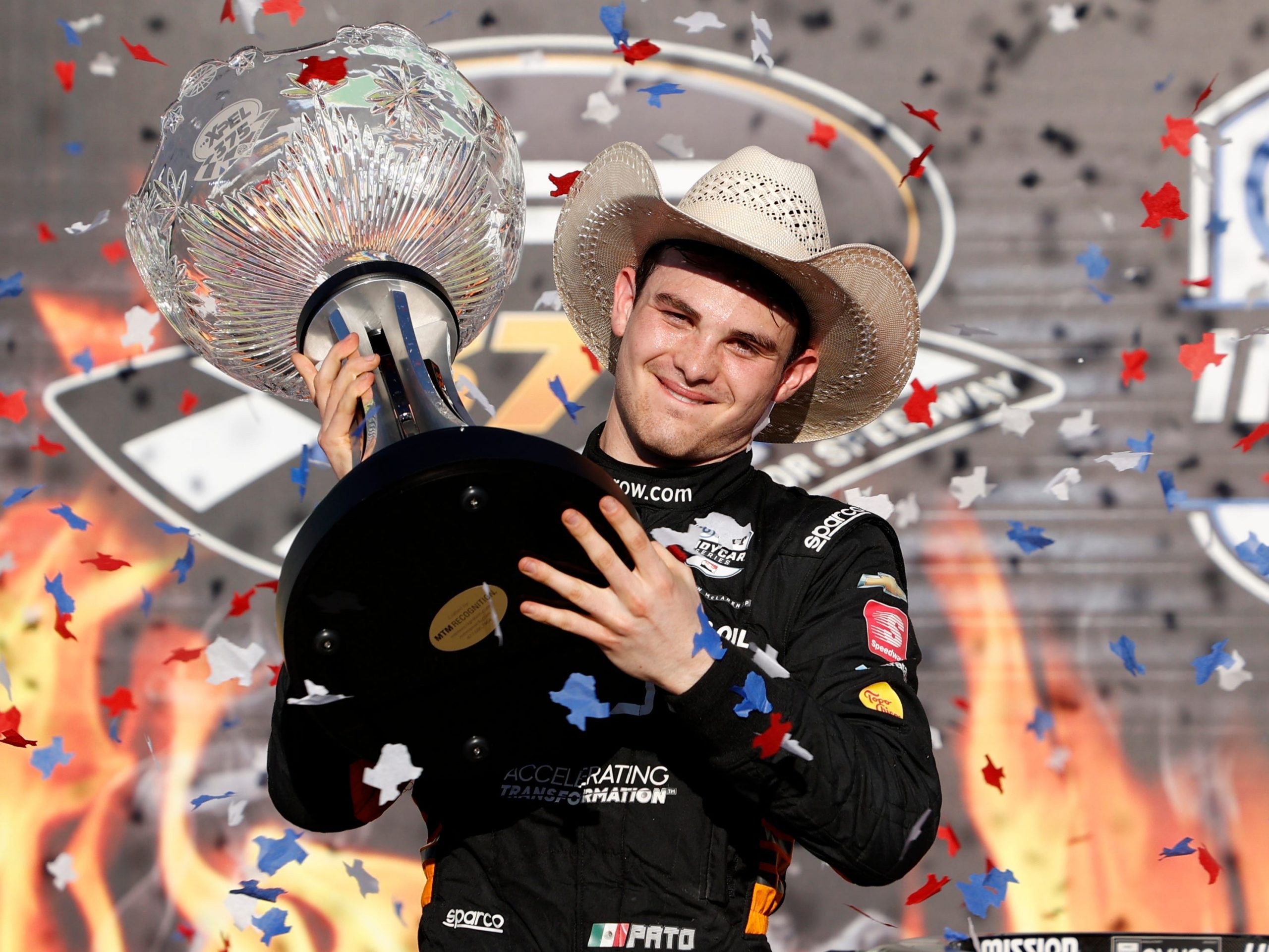 Pato O'Ward celebrates winning at the Texas Motor Speedway