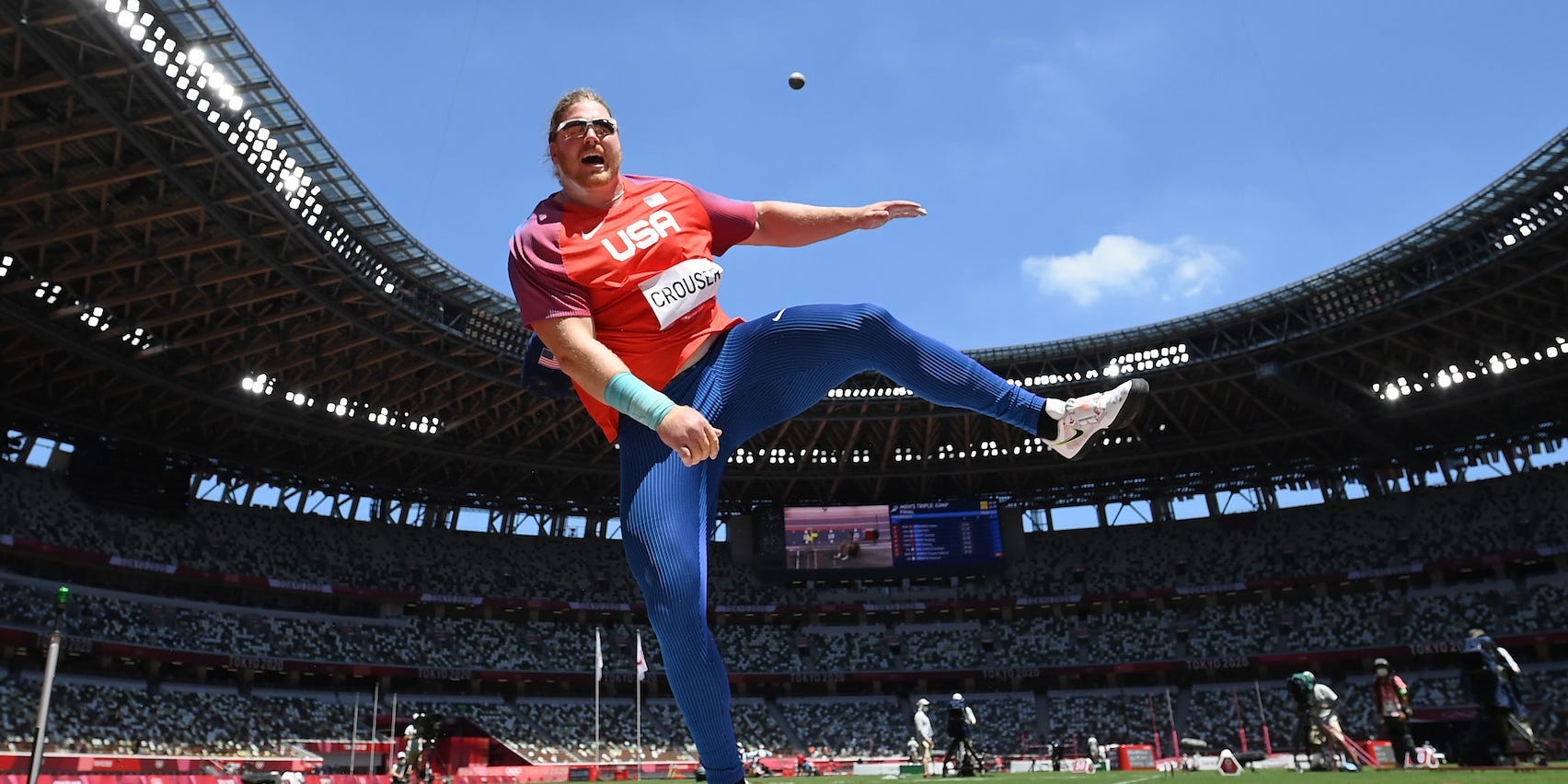 Ryan Crouser yells after throwing in the shot put at the Tokyo Olympics.