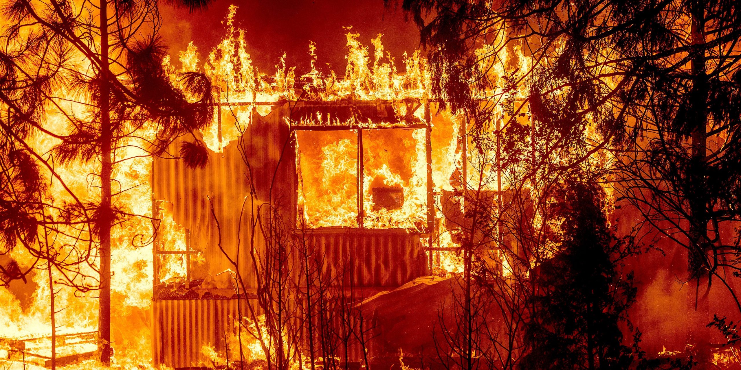 A home in Greenville is engulfed by flames.