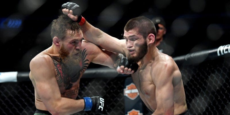 Oct 6, 2018; Las Vegas, NV, USA; Khabib Nurmagomedov (red gloves) fights Conor McGregor (blue gloves) during UFC 229 at T-Mobile Arena. Stephen R. Sylvanie-USA TODAY Sports