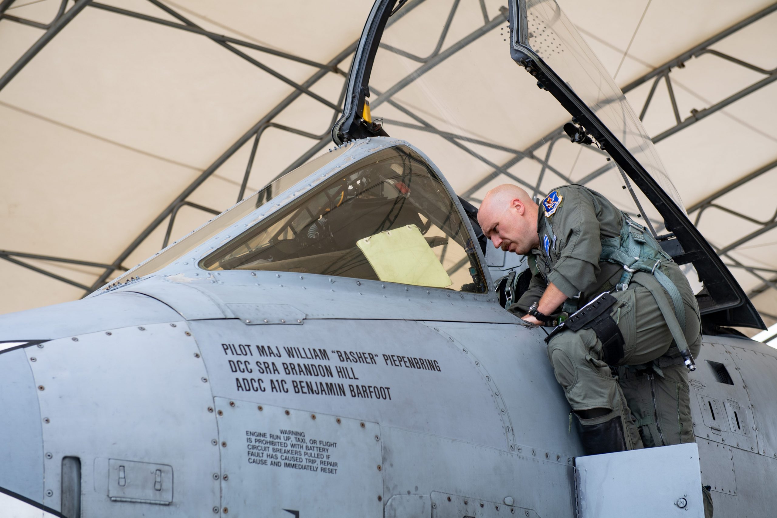 Lt. Col. Matthew Shelly, commander of the 74th Fighter Squadron, conducts pre-flight inspection of his A-10C Thunderbolt II attack aircraft at Moody Air Force Base on June 26, 2021.