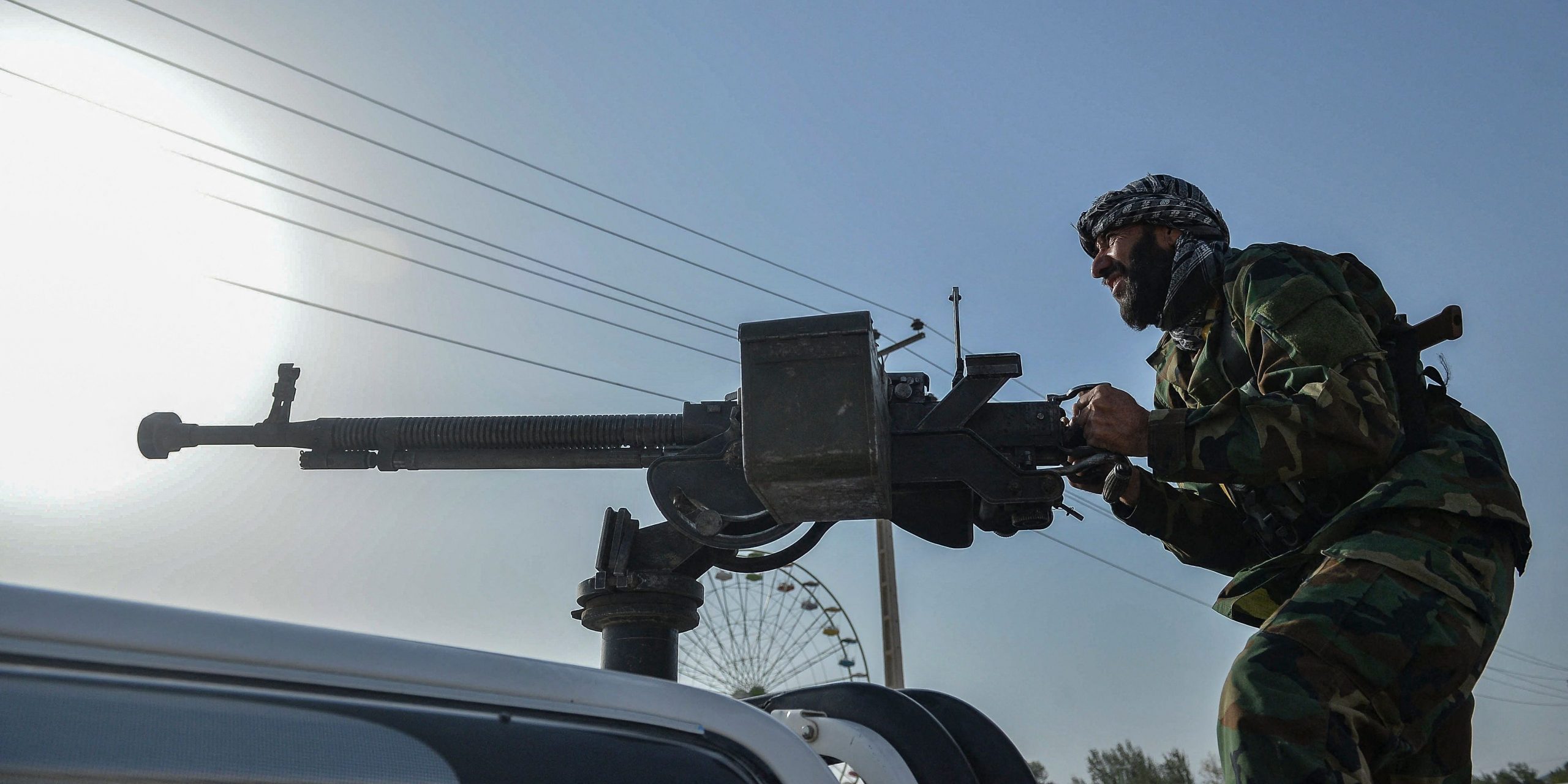 Afghan security personnel and Afghan militia fighting against Taliban