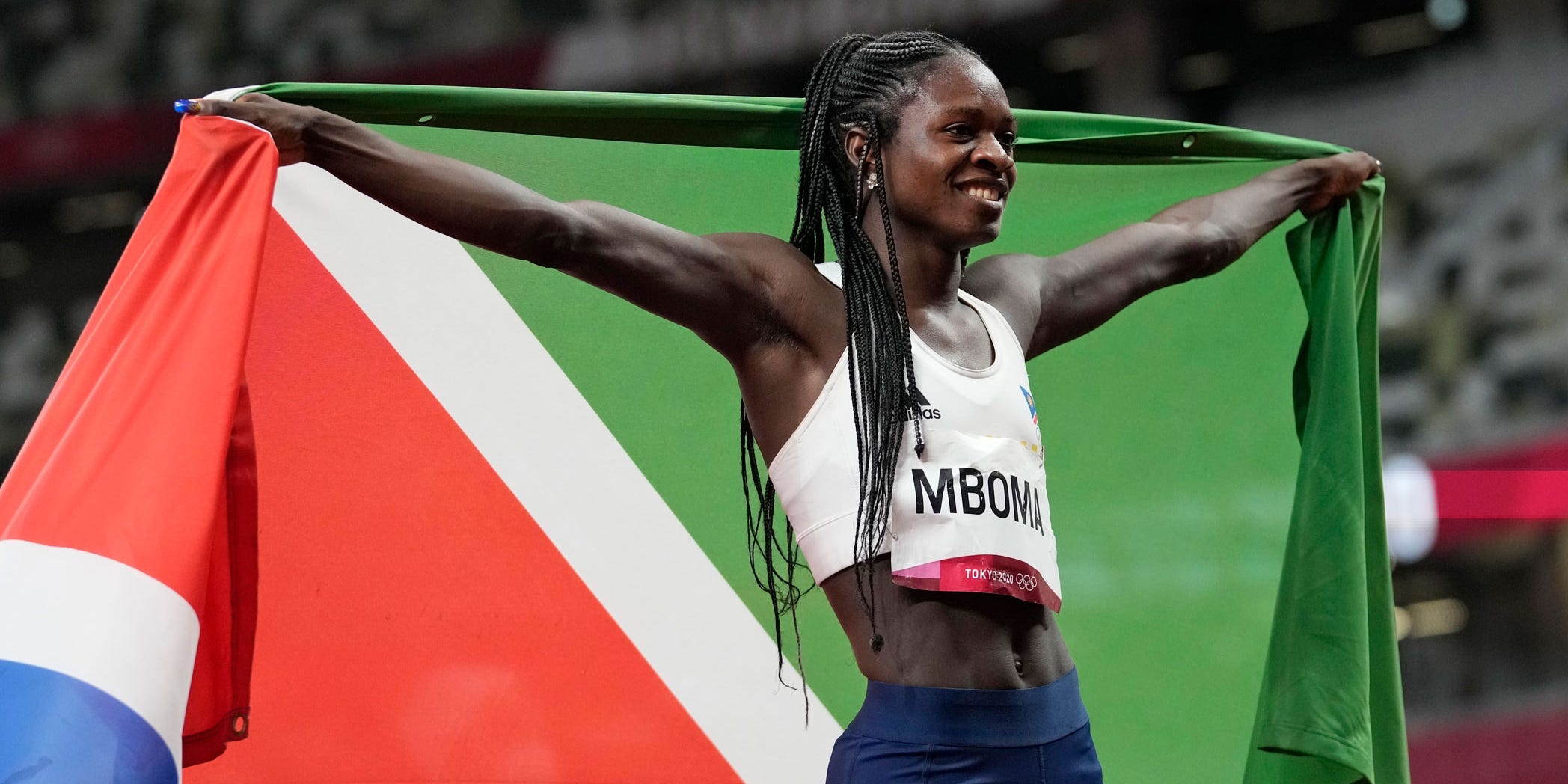 Namibia's Christine Mboma celebrates silver medal at Tokyo 2020.