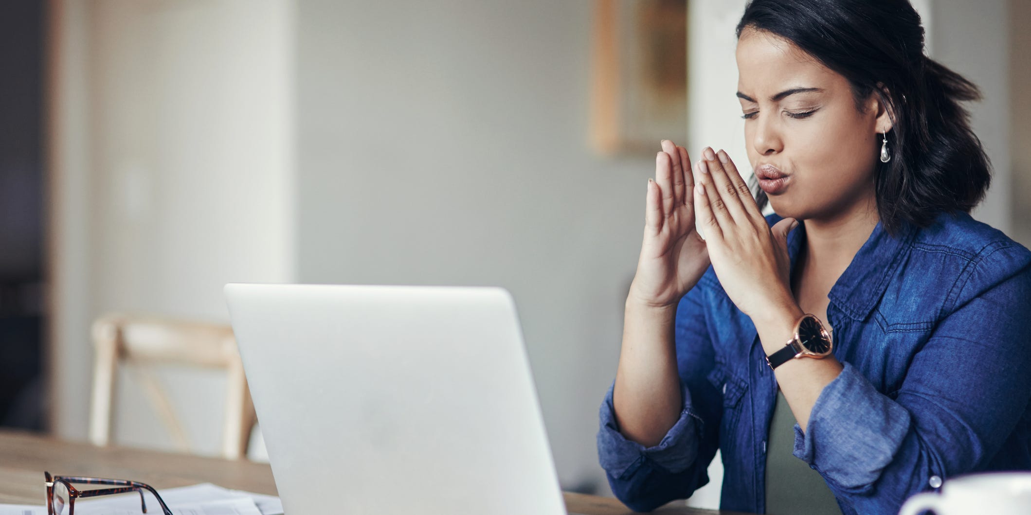 woman breathing out in frustration