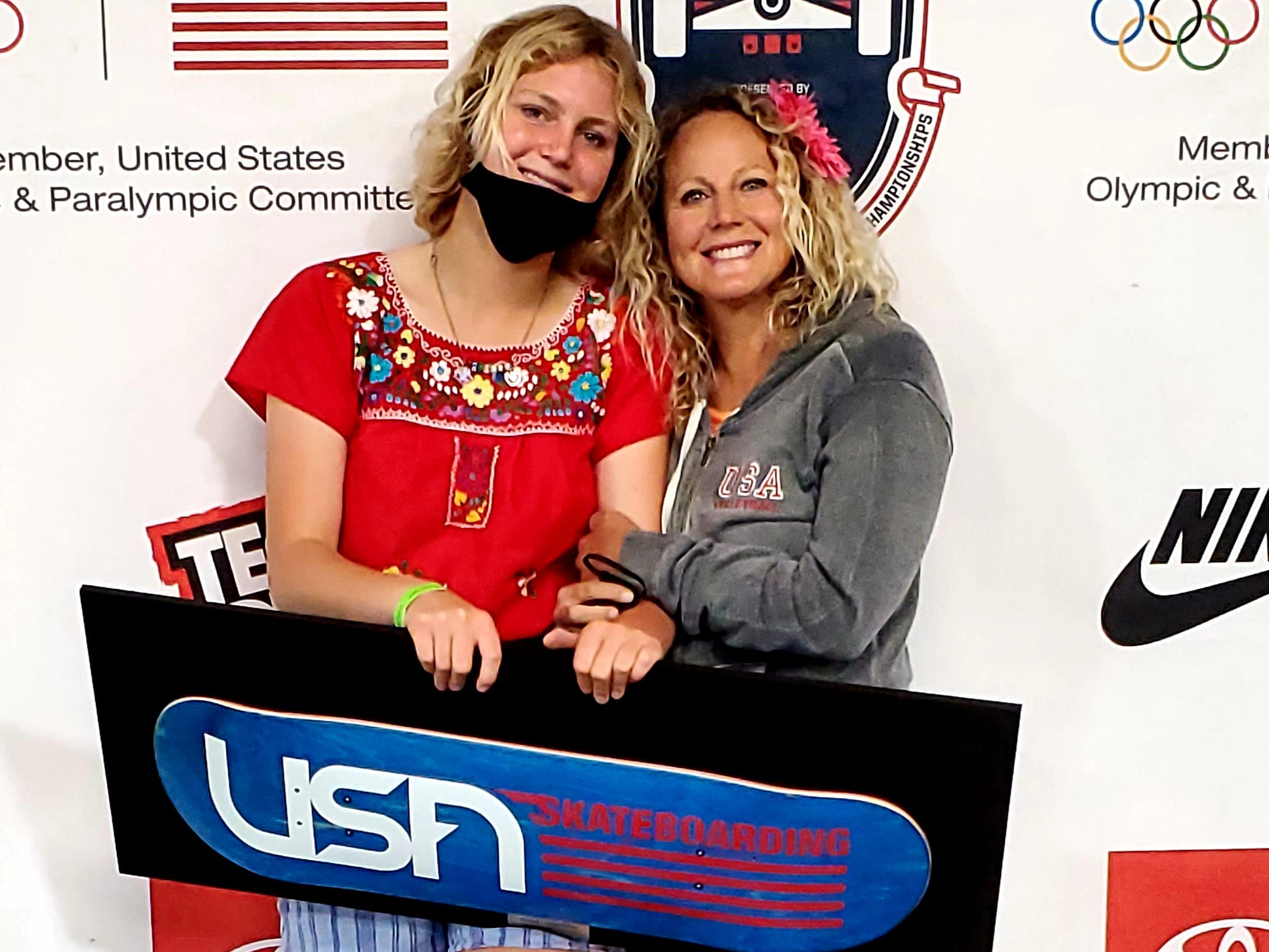 Bryce and Donna Wettstein pose after Bryce wins 3rd place at the USA Skate National Championships in May 2021.