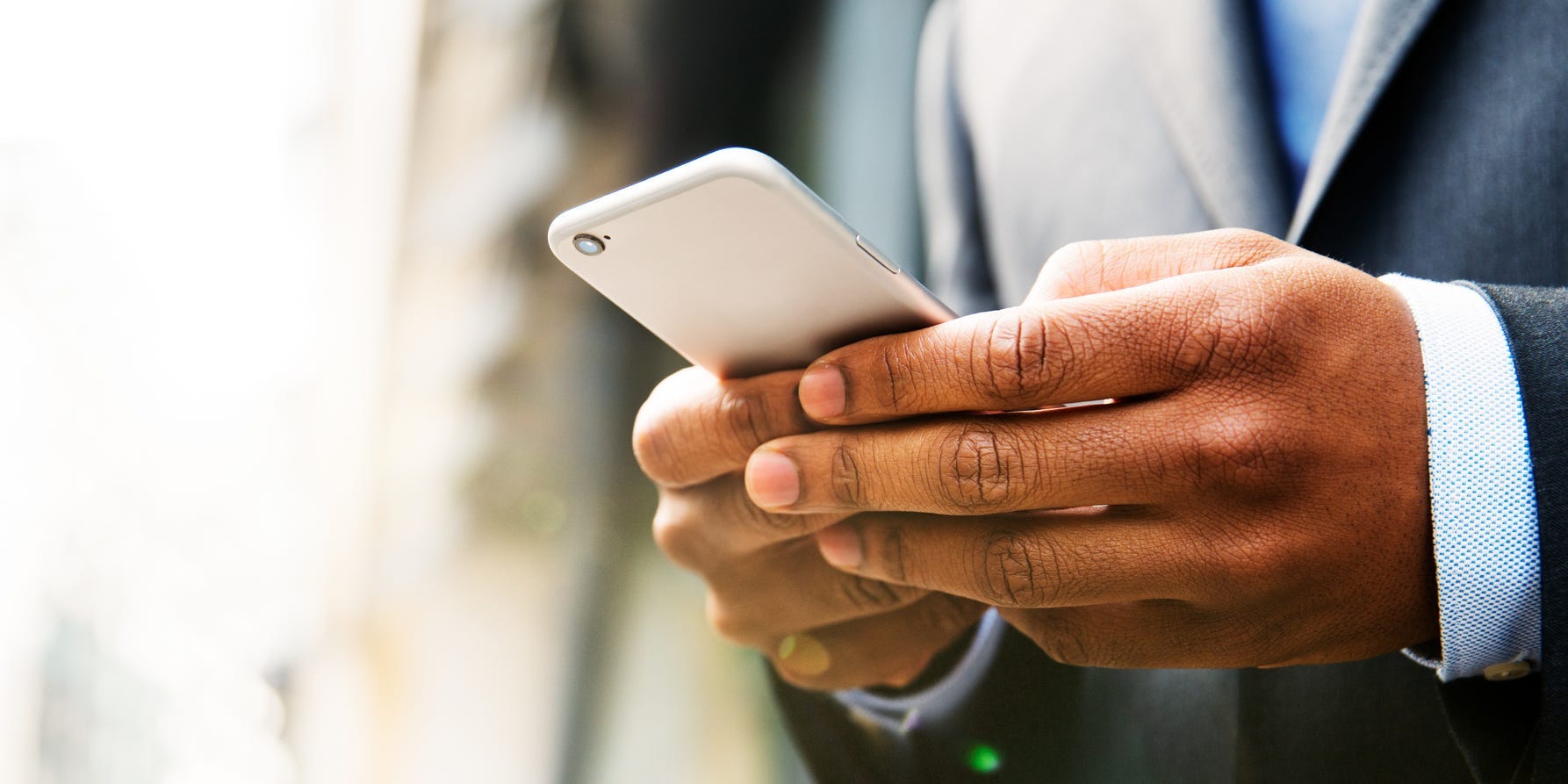 Man texting on phone