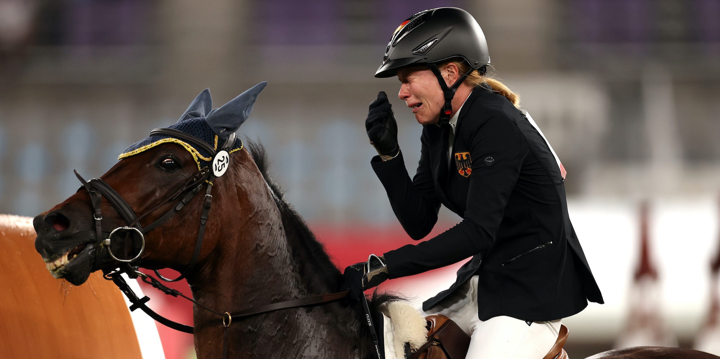 Annika Schleu of Team Germany looks dejected following her run in the Riding Show Jumping of the Women's Modern Pentathlon.