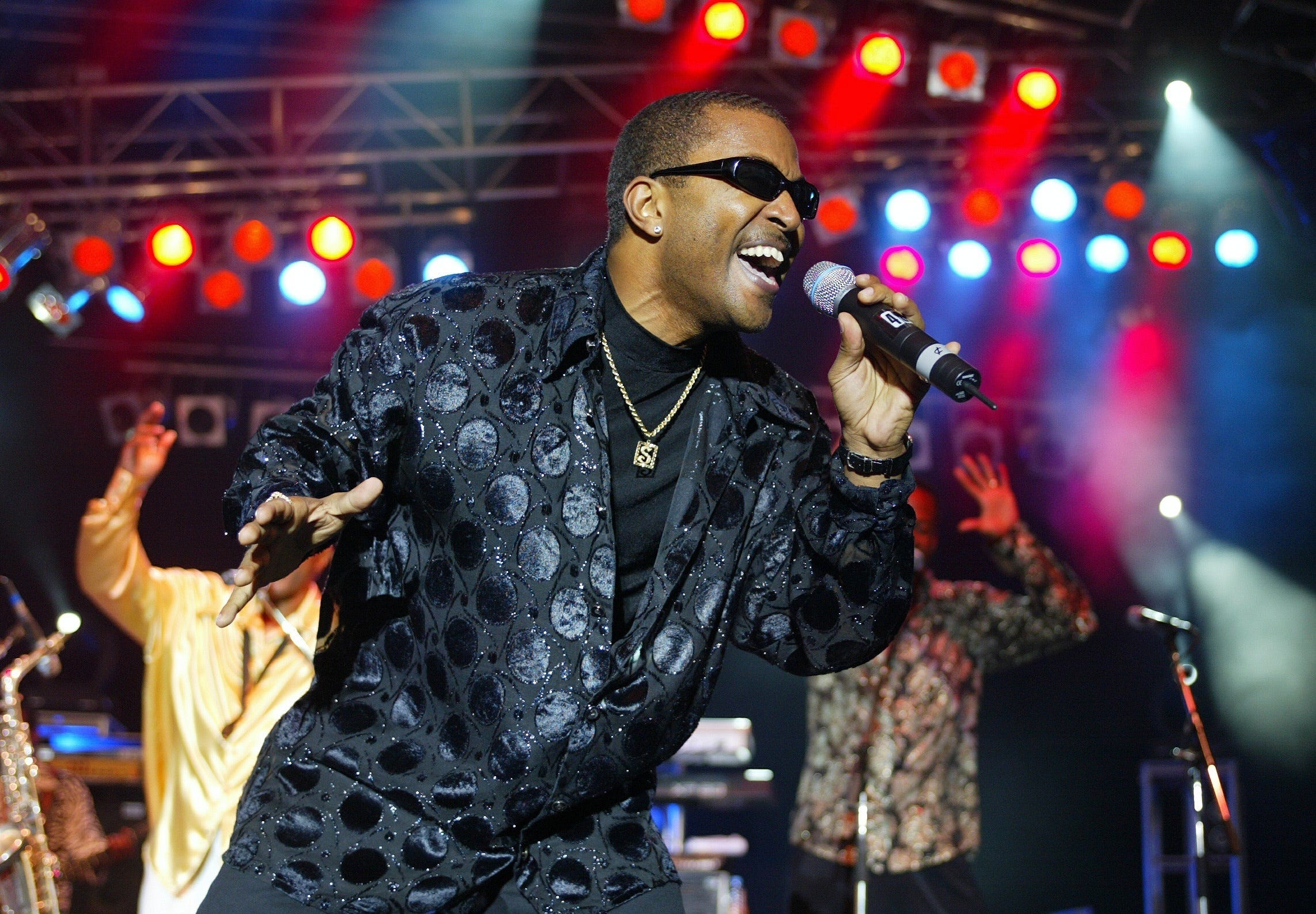 A picture of Dennis Thomas performing with Kool & The Gang.