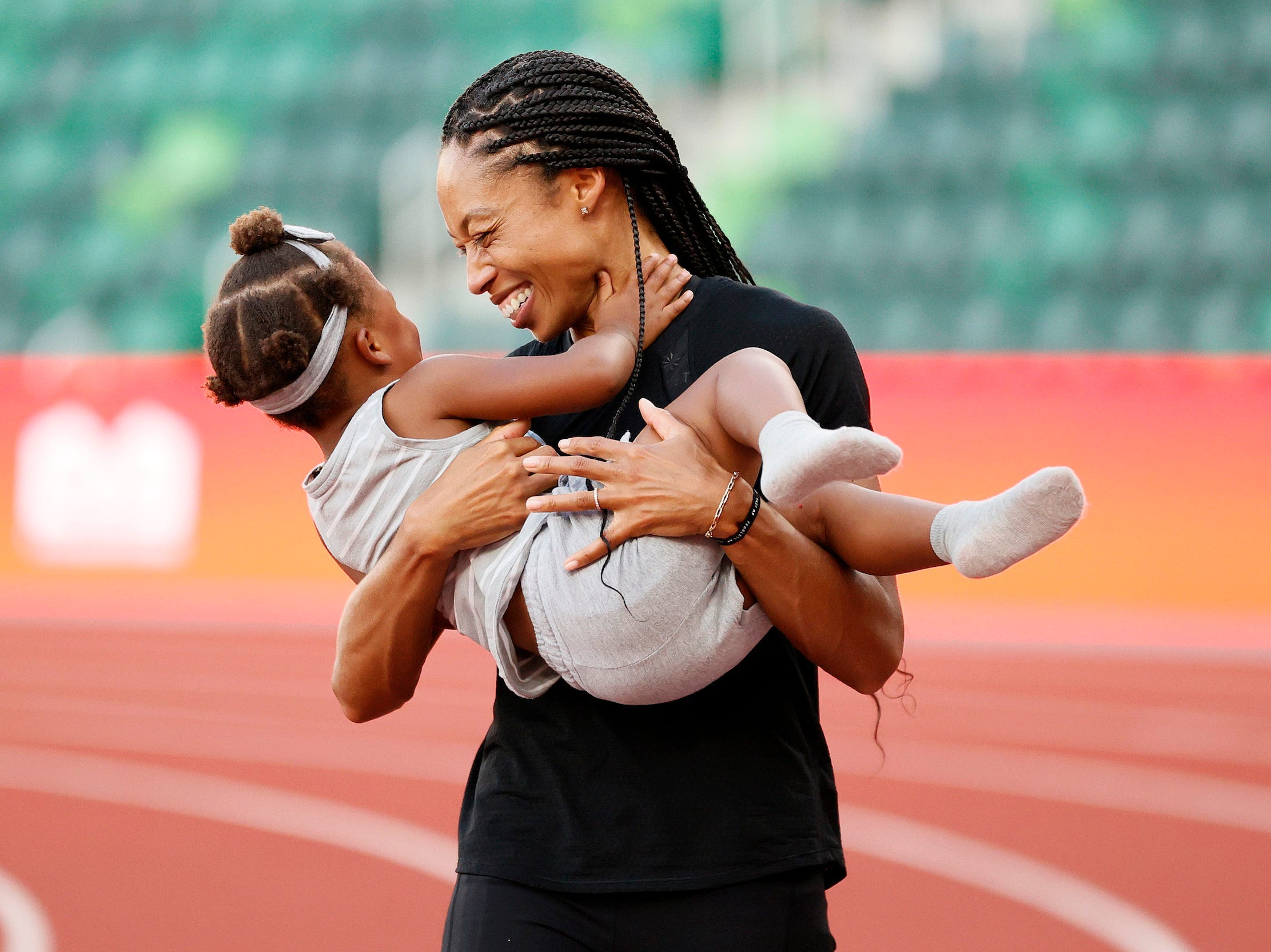 Allyson Felix celebrates with her daughter Camryn after day nine of the 2020 U.S. Olympic Track & Field Team Trials at Hayward Field on June 26, 2021 in Eugene, Oregon.