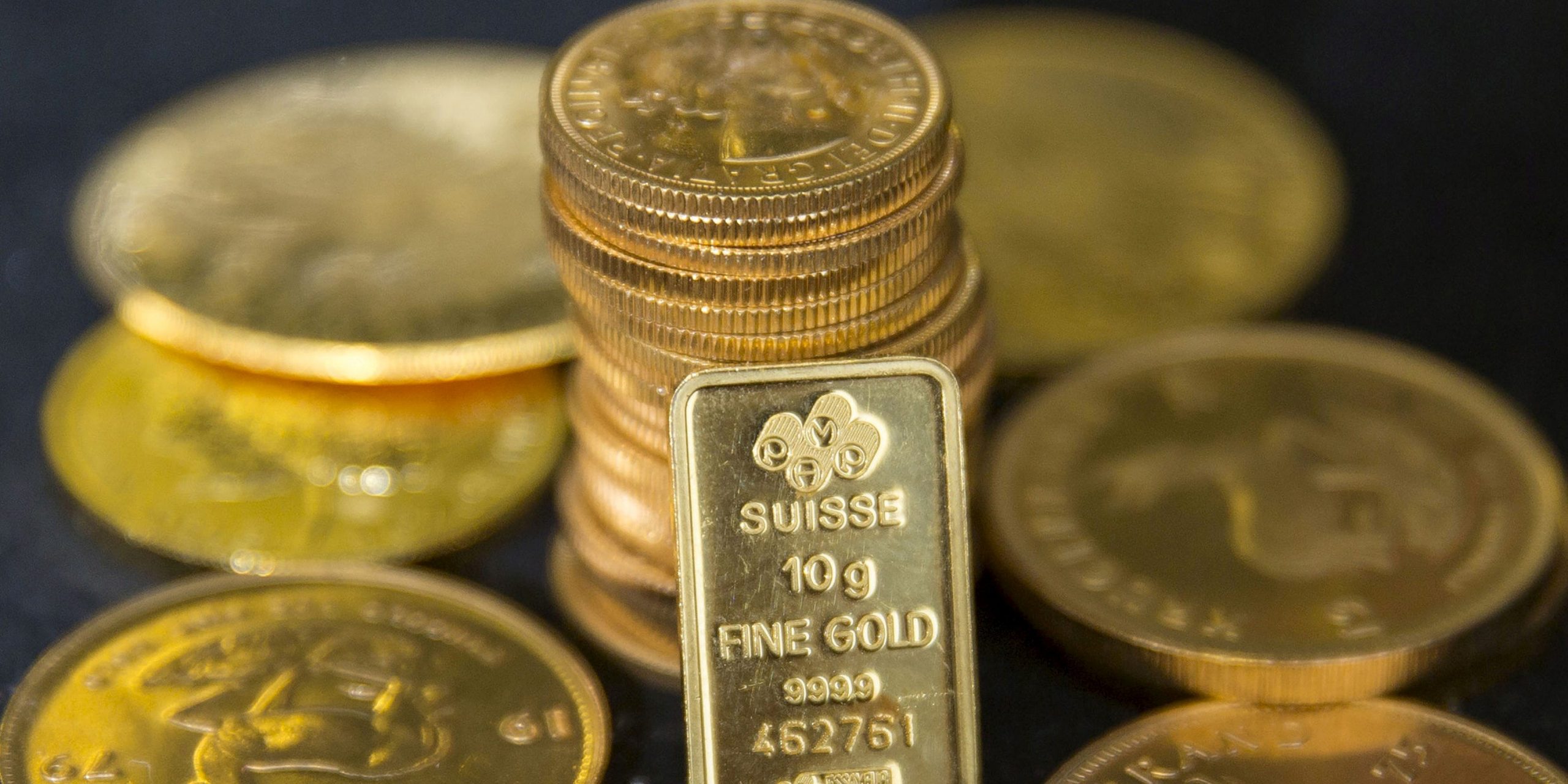 FILE PHOTO: Gold bullion is displayed at Hatton Garden Metals precious metal dealers in London, Britain July 21, 2015. REUTERS/Neil Hall