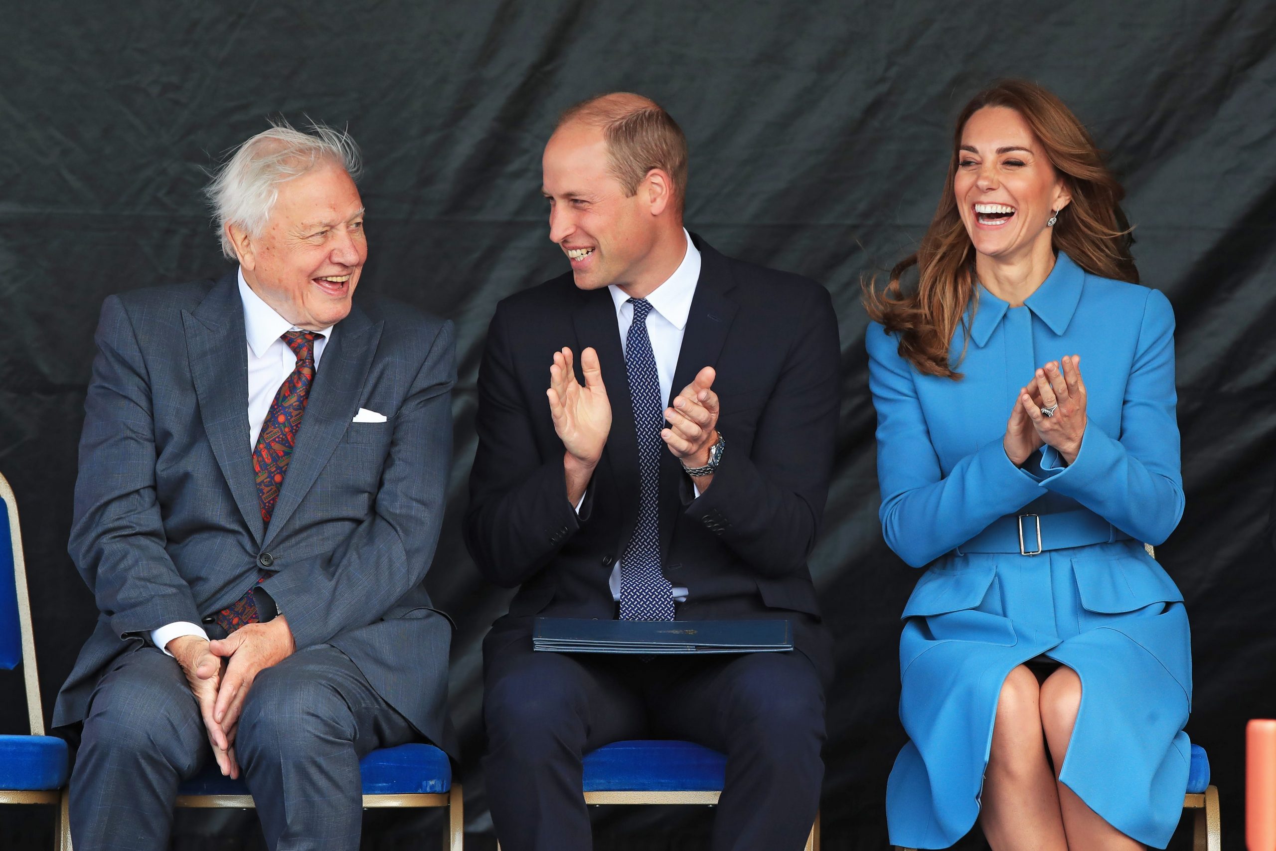 Sir David Attenborough (left) sitting next to Prince William (center) and Kate Middleton (right) in September 2019.