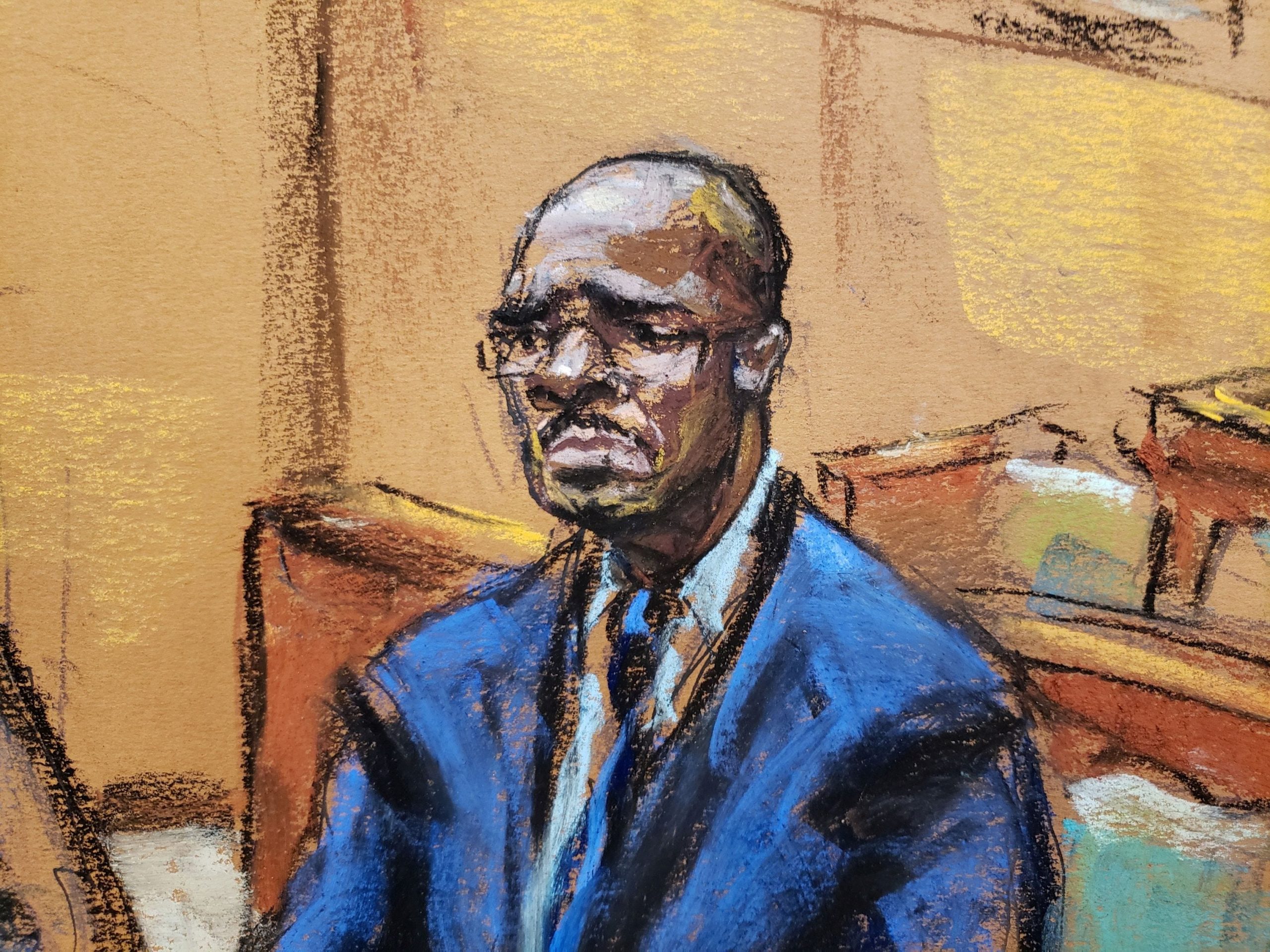 A courtroom sketch of R. Kelly in a blue suit.