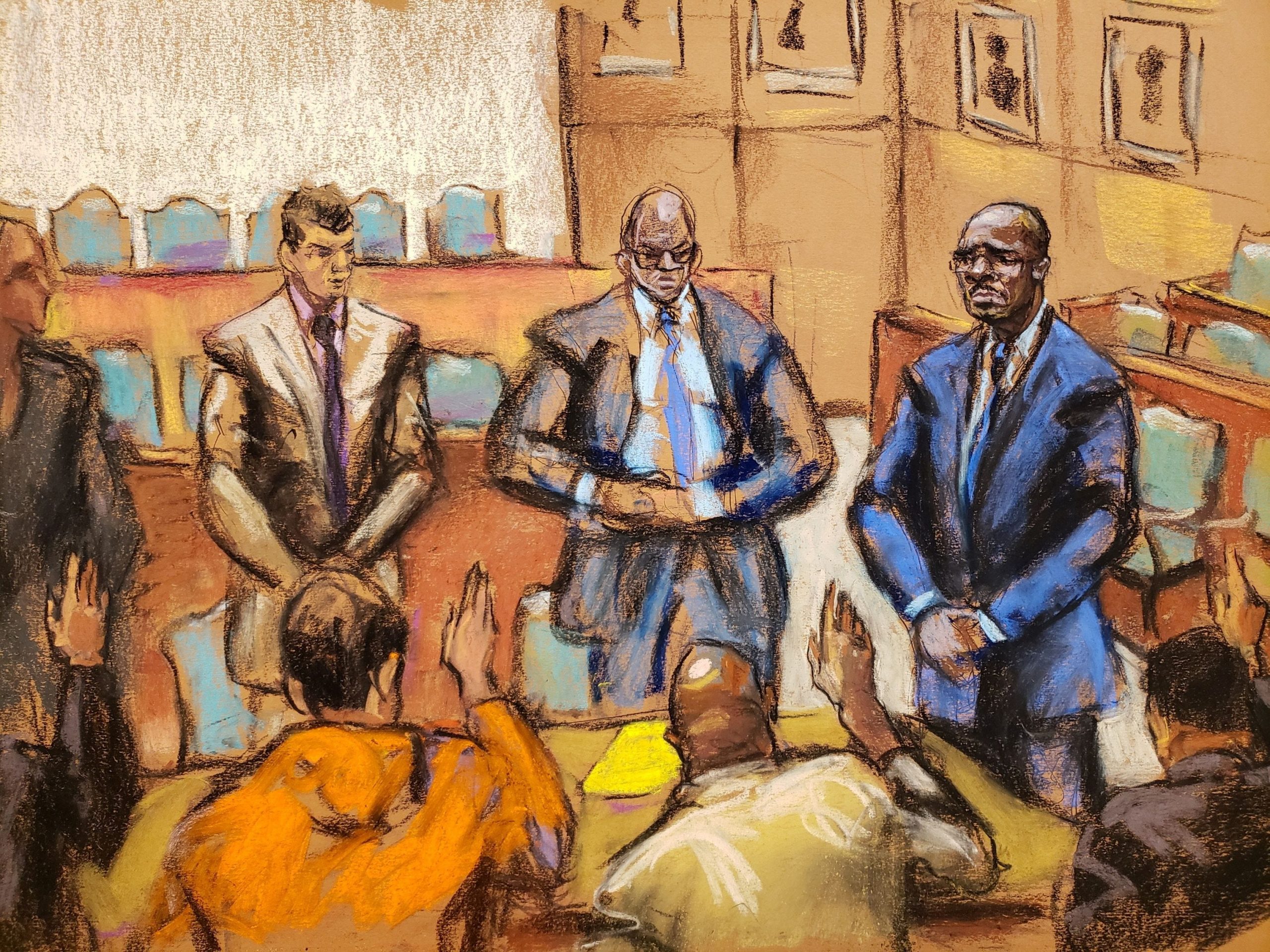 A courtroom sketch of attorneys and R. Kelly in suits standing before prospective jurors who are raising their hands.