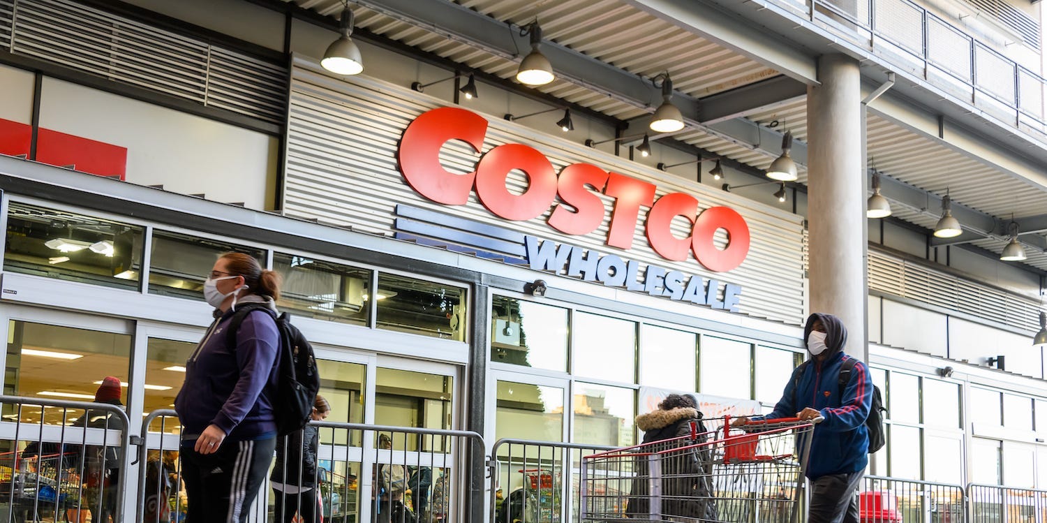 Costco shoppers outside one of its stores