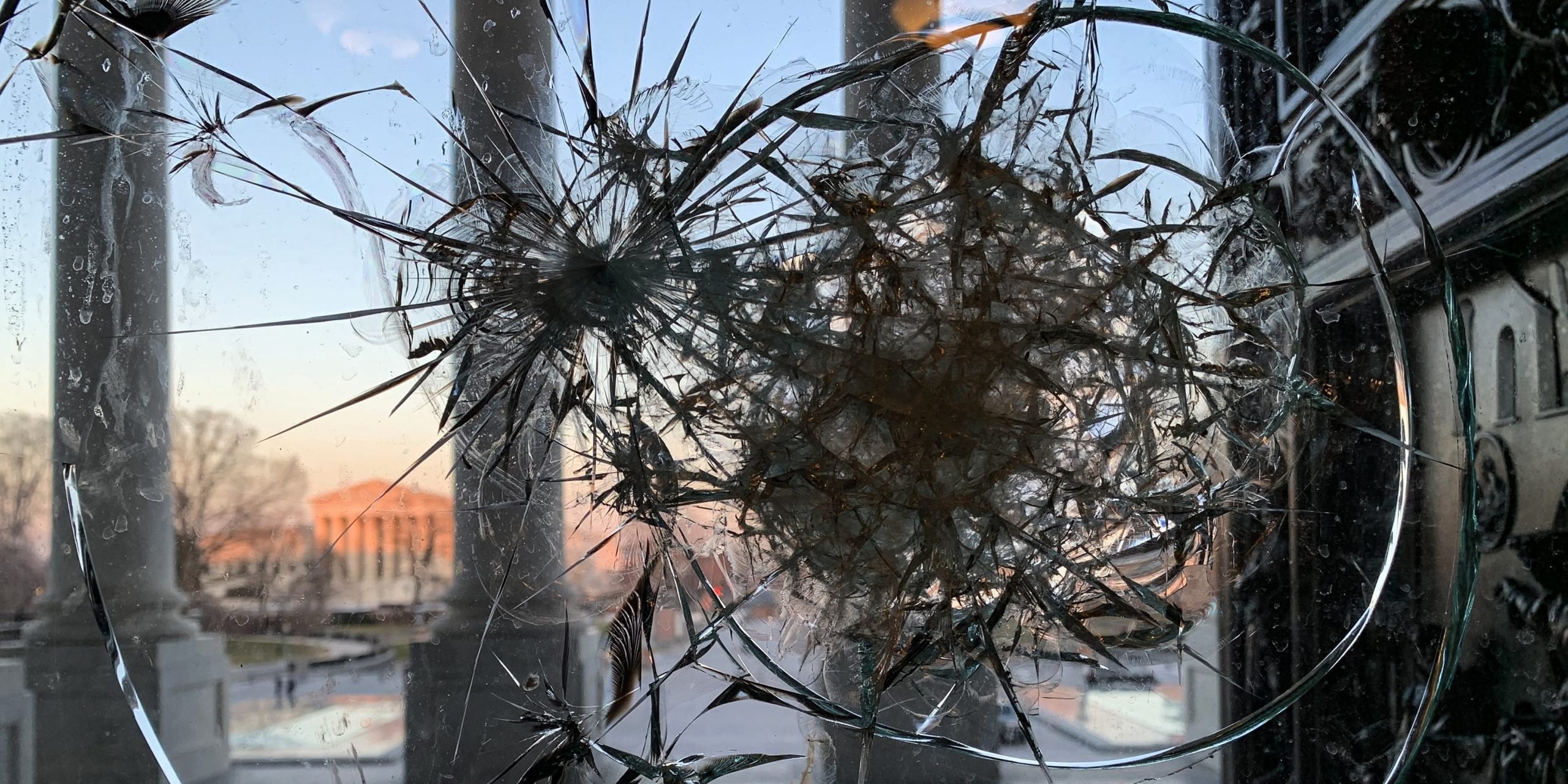 A broken window in the US Capitol.