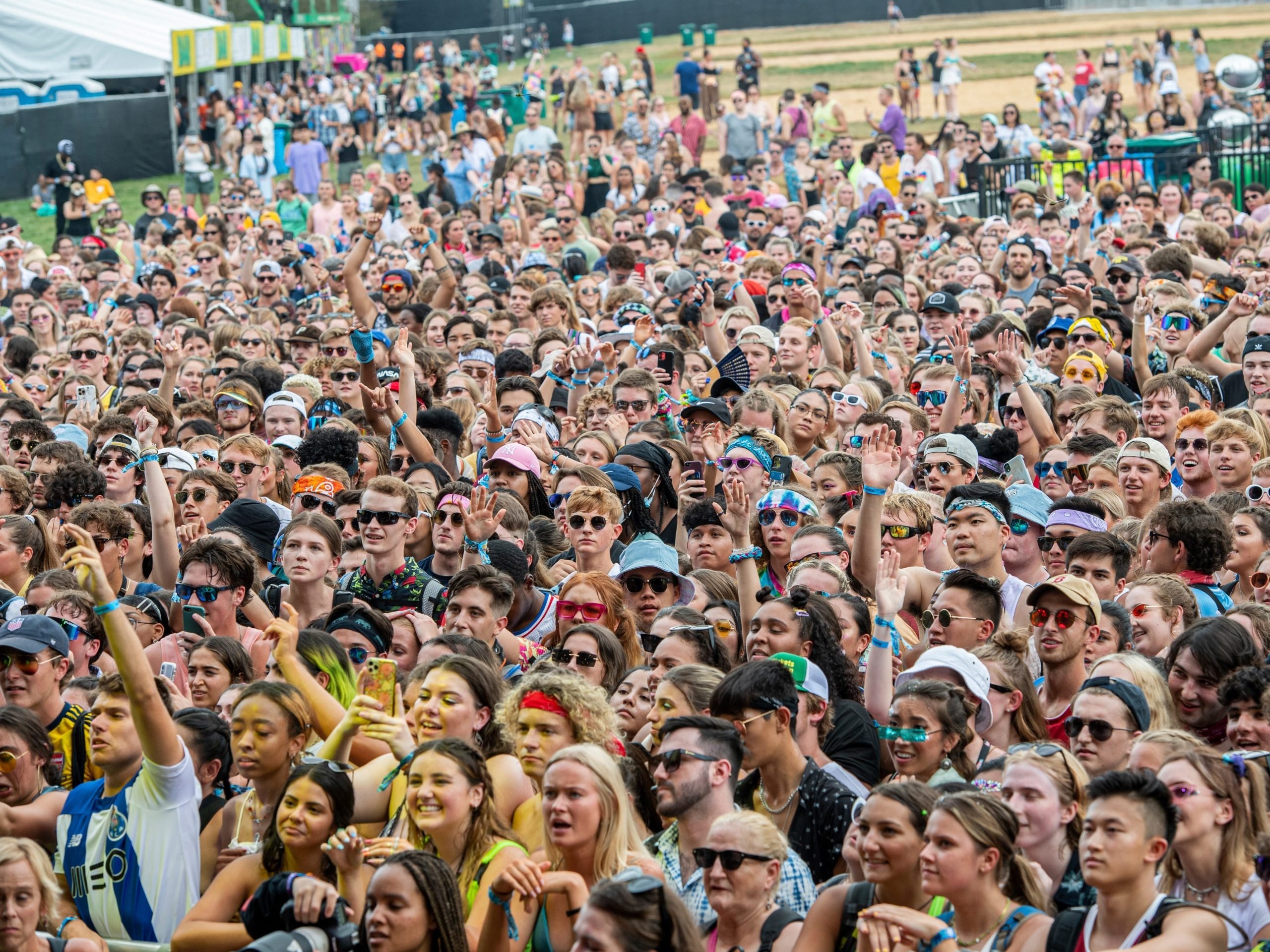 Large crowd of festival goers looking at stage