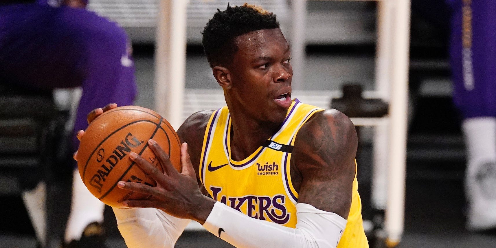 Dennis Schroder holds the ball during a Lakers game in 2021.