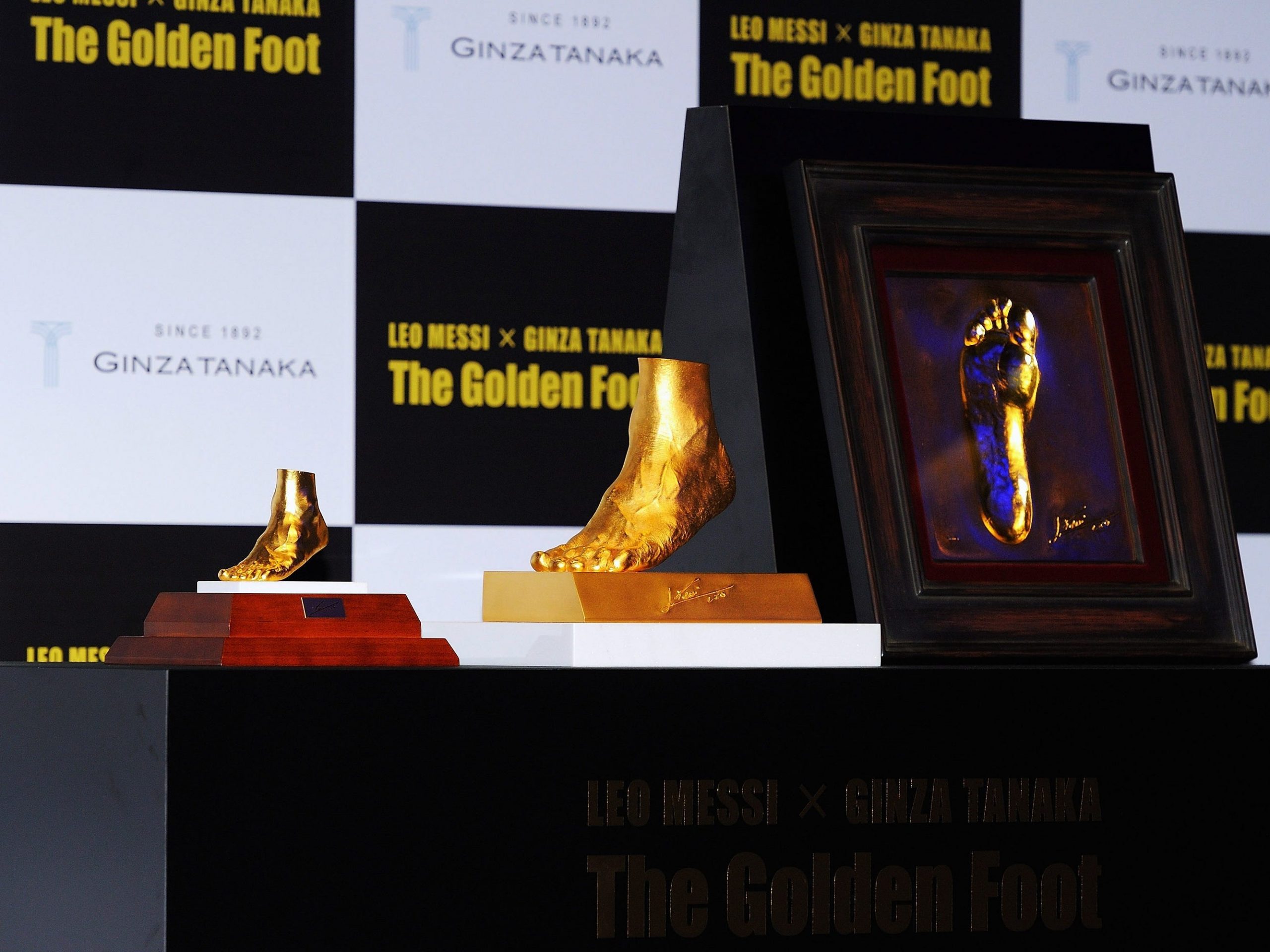 Golden replicas of Lionel Messi's foot