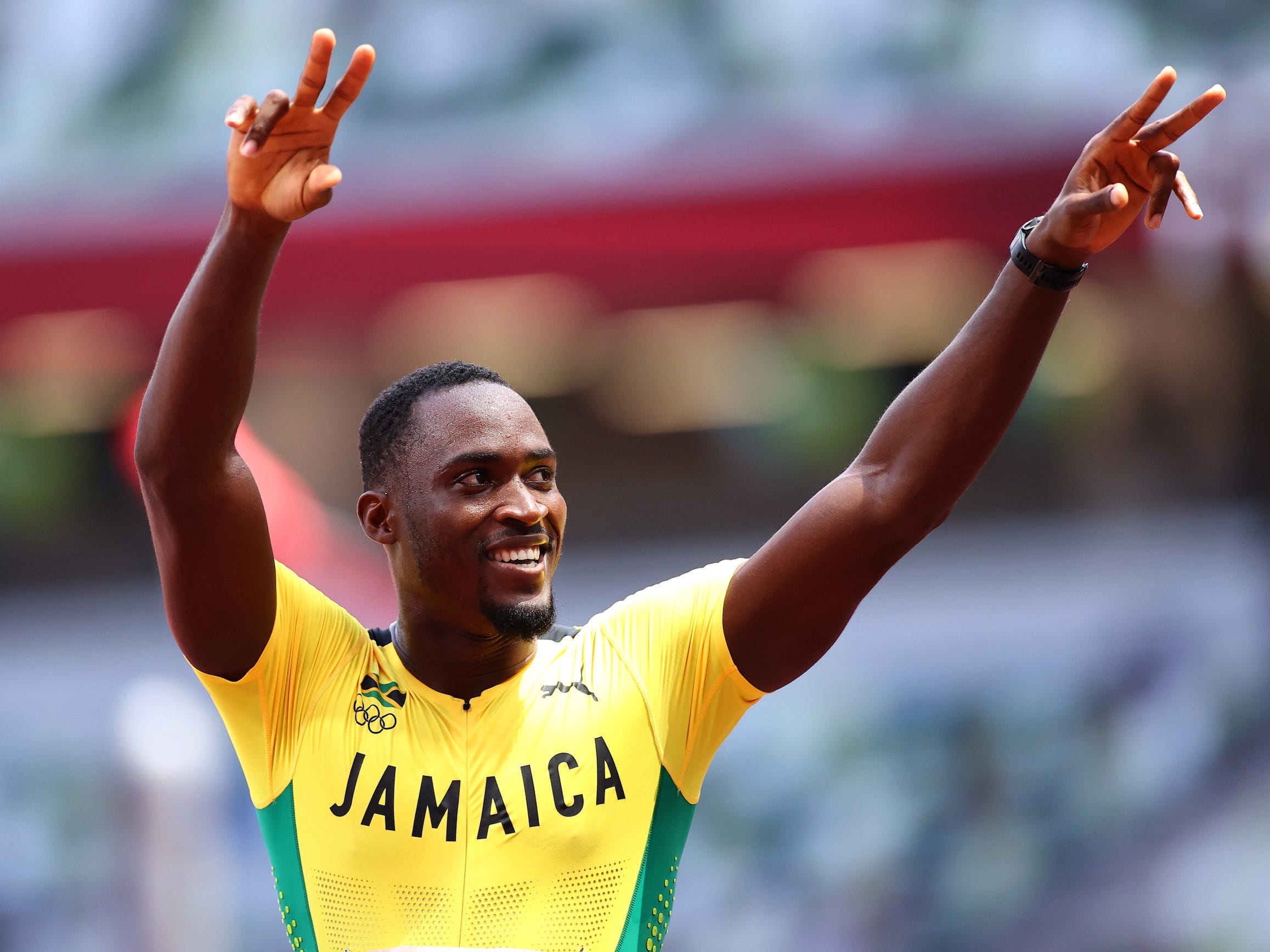 Hansle Parchment gestures after winning gold in Tokyo.