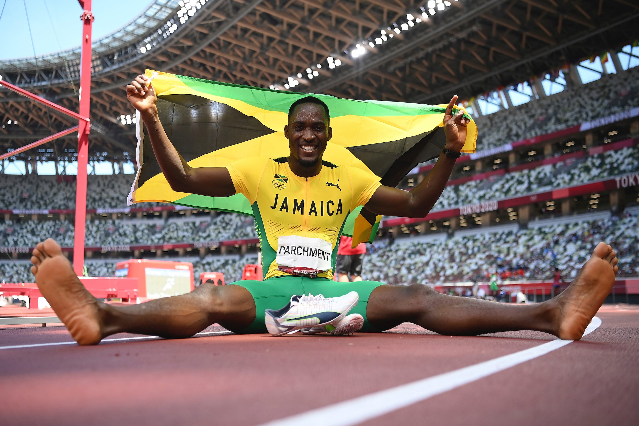 Hansle Parchment reacts to winning gold at the Tokyo Olympics.