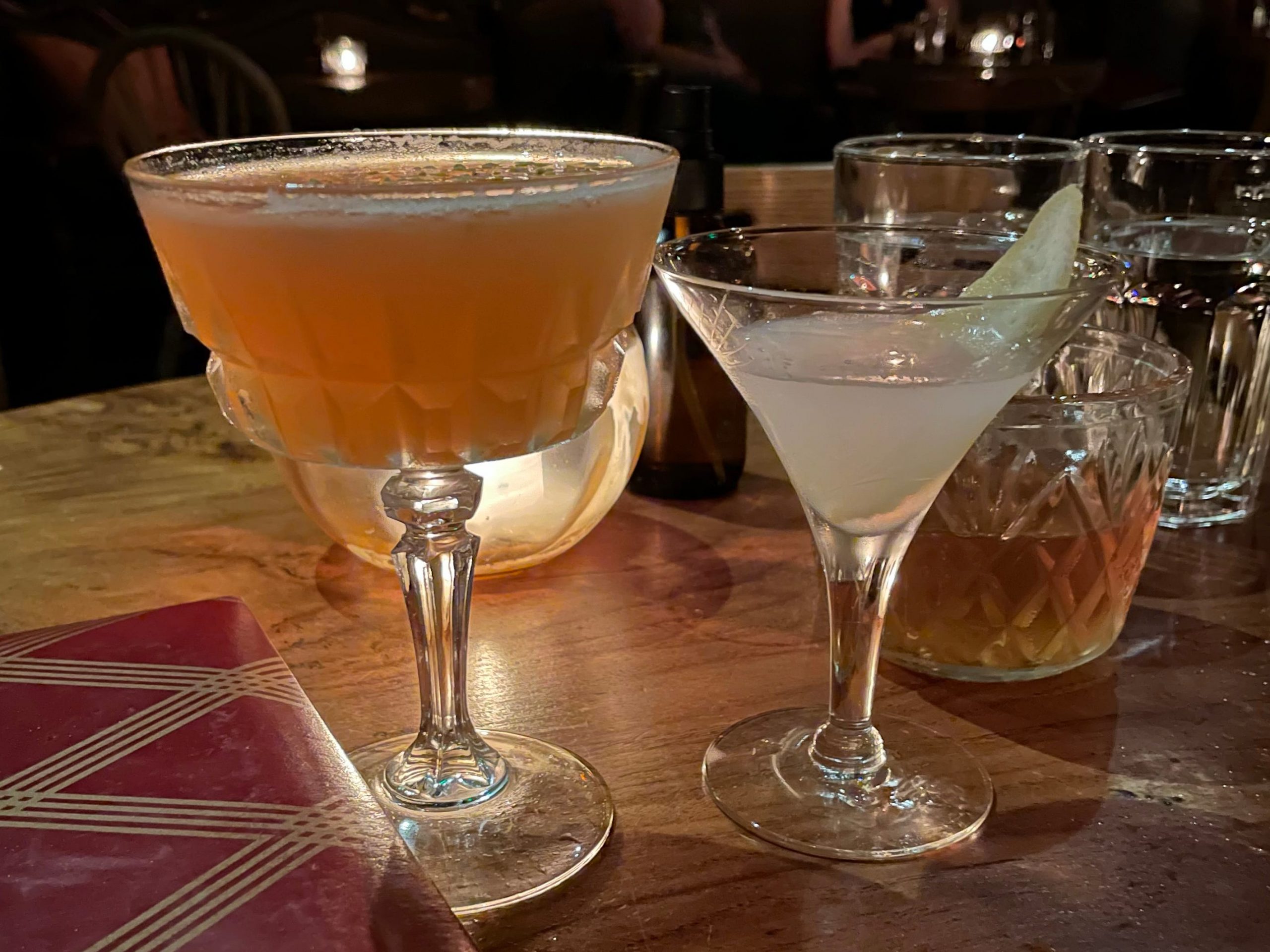 Young joni cocktails on wood table in Minneapolis