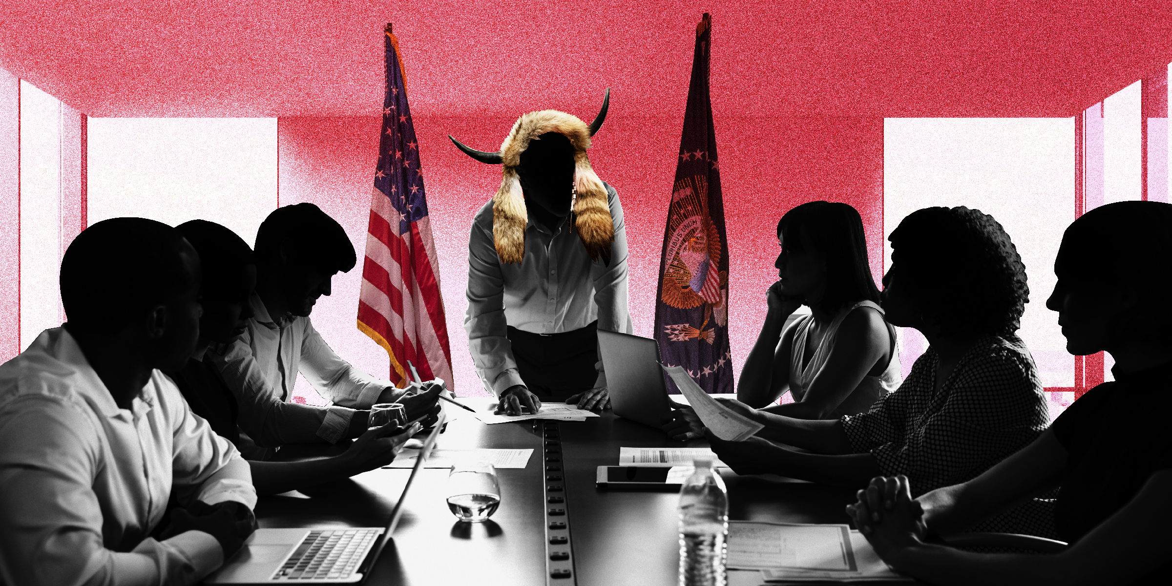 boardroom meeting with a leader in the center wearing Qanon Shaman horns against a red background with American flags