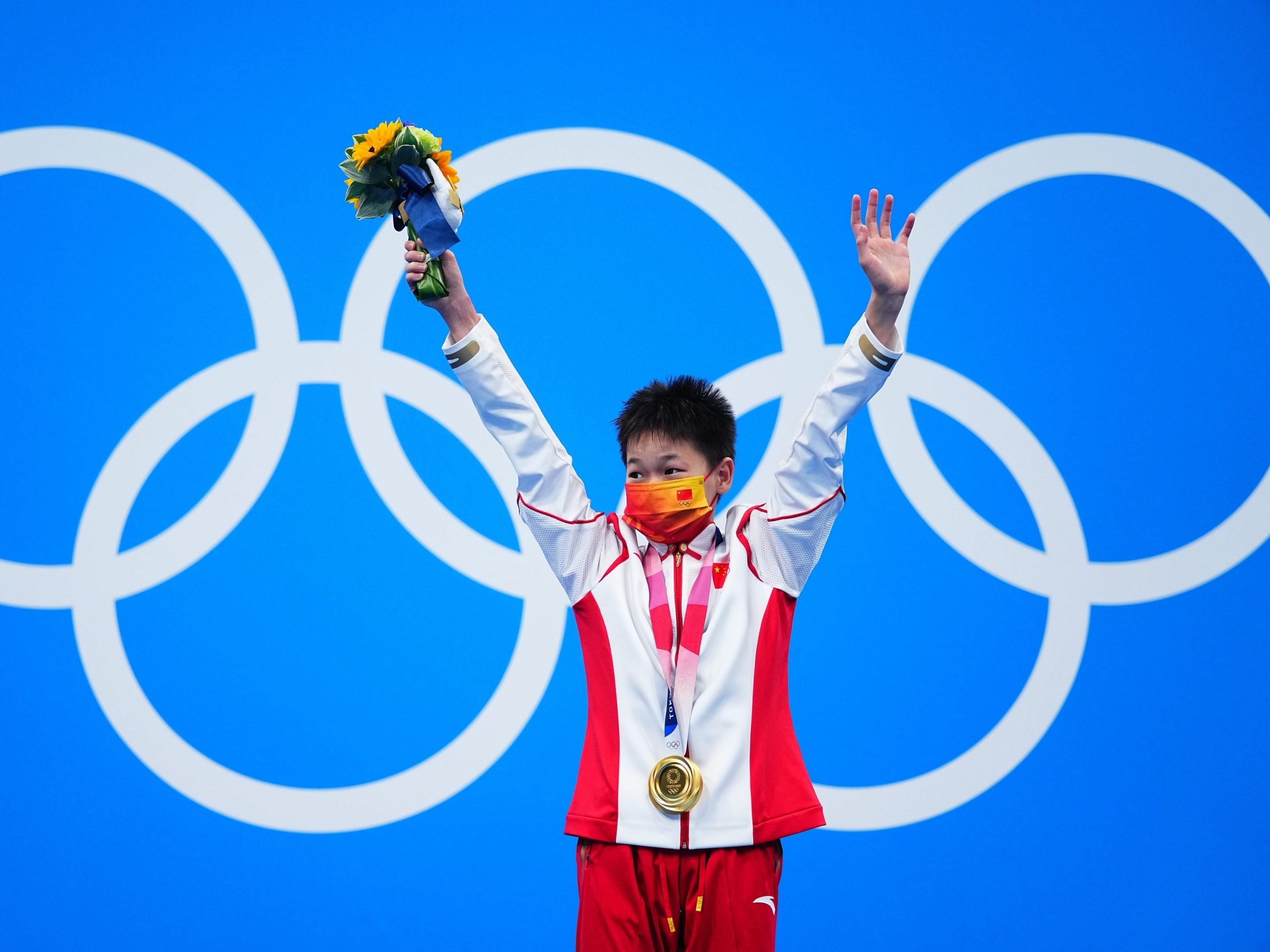 Quan Hongchan of China reacts during the awarding ceremony for the women's 10m platform final of diving at the Tokyo 2020 Olympic Games