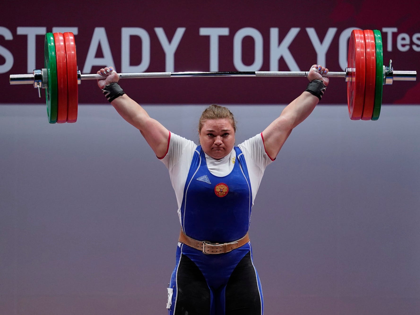 Tatiana Kashirina of Russia competes in the women's +87kg weightlifting on day two of the Ready Steady Tokyo - Weightlifting, Tokyo 2020 Olympic Games test event at the Tokyo International Forum