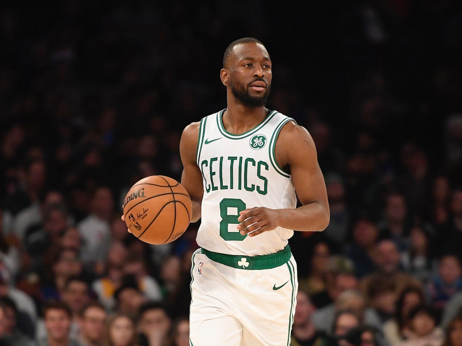Kemba Walker dribbles a basketball