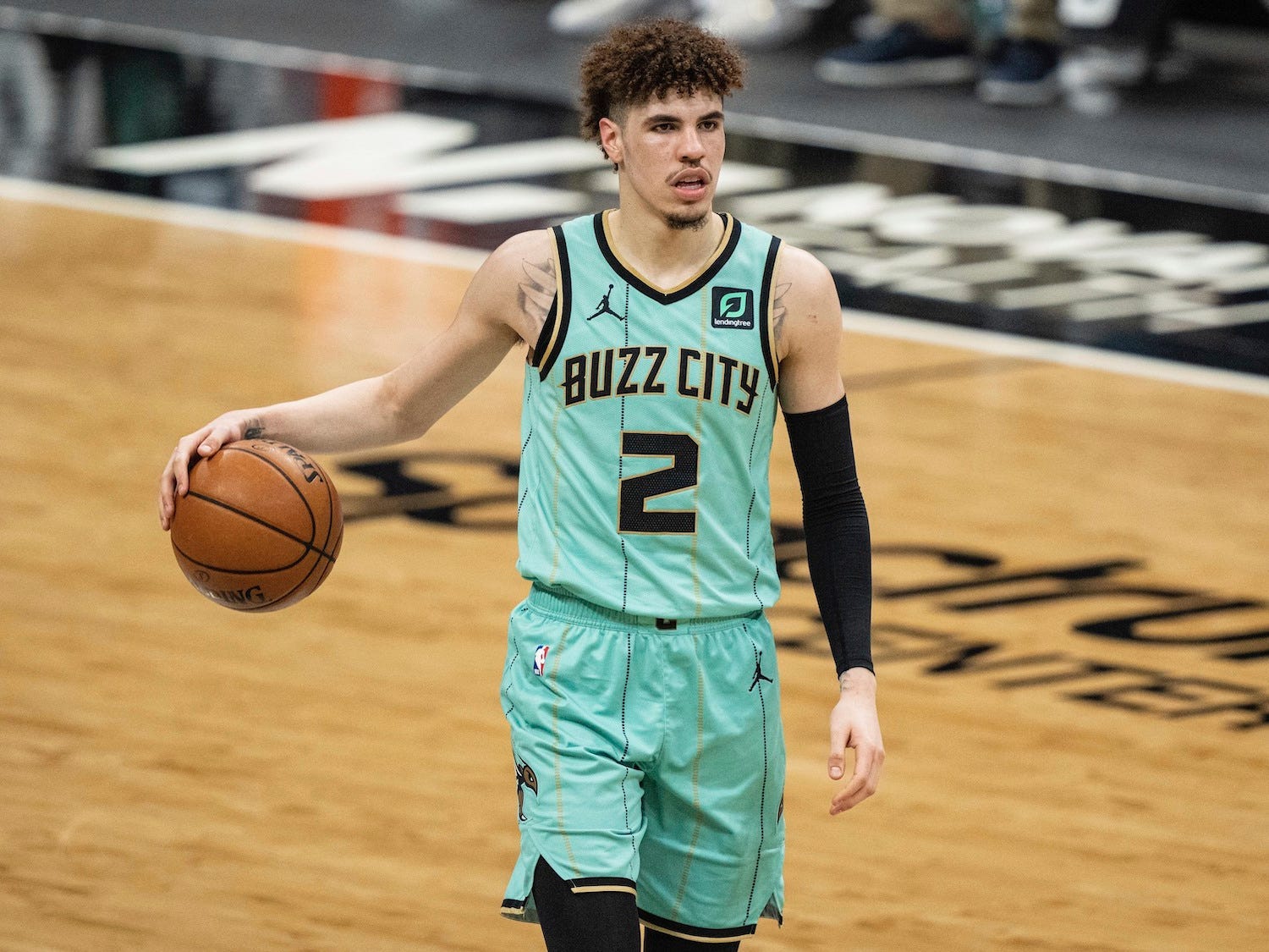 LaMelo Ball dribbles during a game.