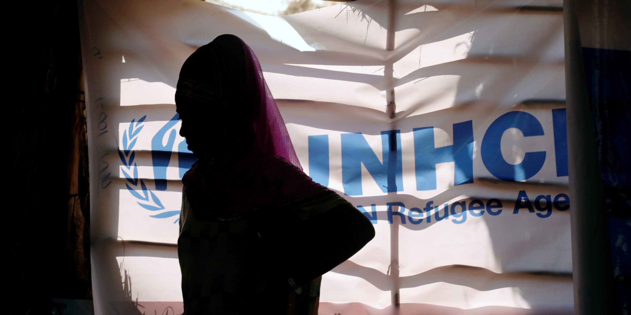 An Ethiopian refugee stands as she is registered by the United Nations High Commissioner for Refugees (UNHCR) at the Um Rakuba refugee camp which houses Ethiopian refugees fleeing the fighting in the Tigray region.