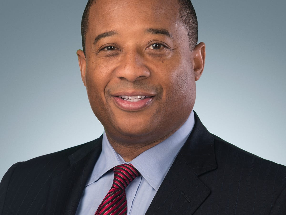 A headshot of Steven Mizell, Merck's executive vice president and chief human resources officer​, wearing a suit and tie.