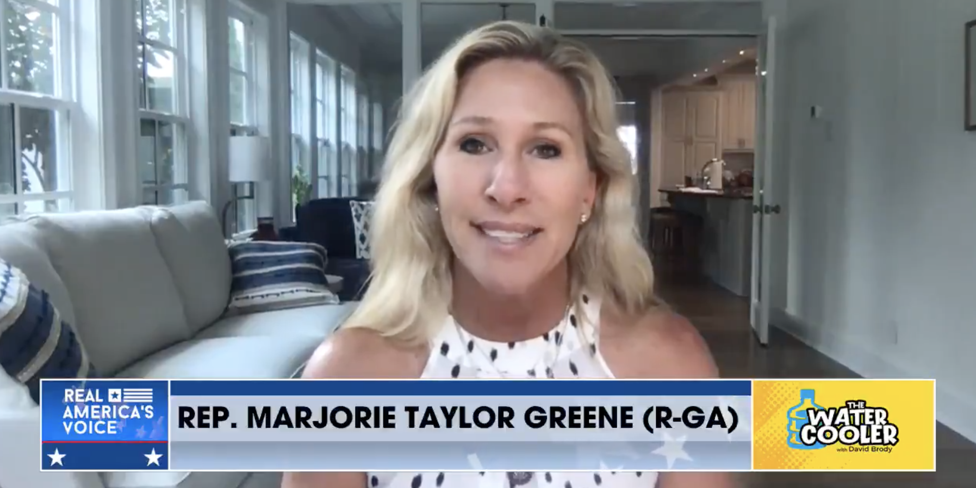A still of Rep. Marjorie Taylor Greene on Real America's Voice.